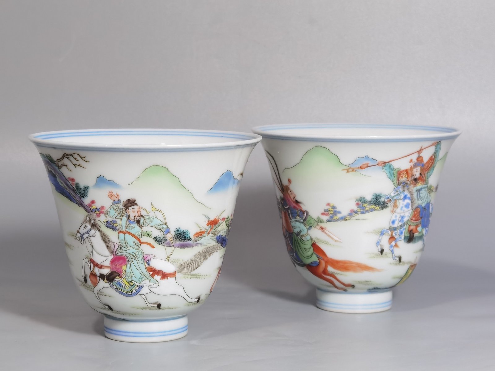 Qing Dynasty Yongzheng a pastel colored saber and horse figure warrior bell cup