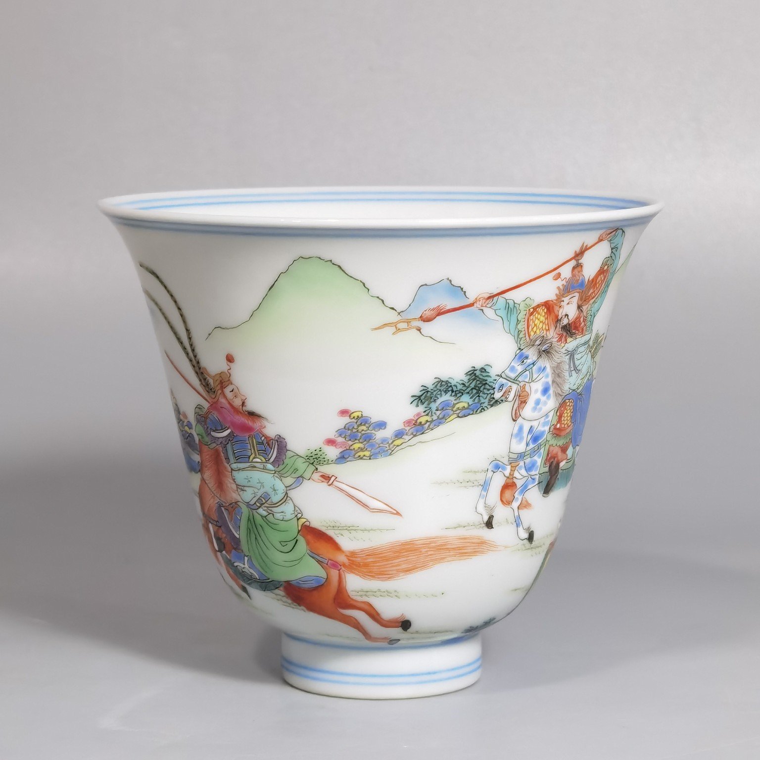 Qing Dynasty Yongzheng a pastel colored saber and horse figure warrior bell cup