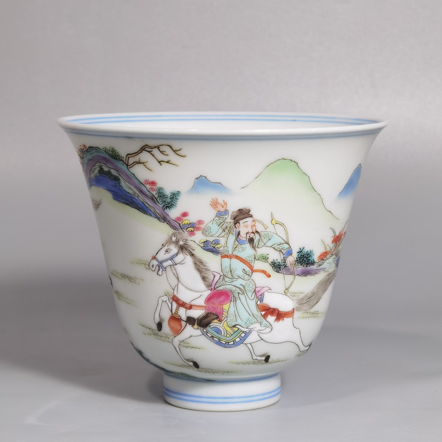 Qing Dynasty Yongzheng a pastel colored saber and horse figure warrior bell cup