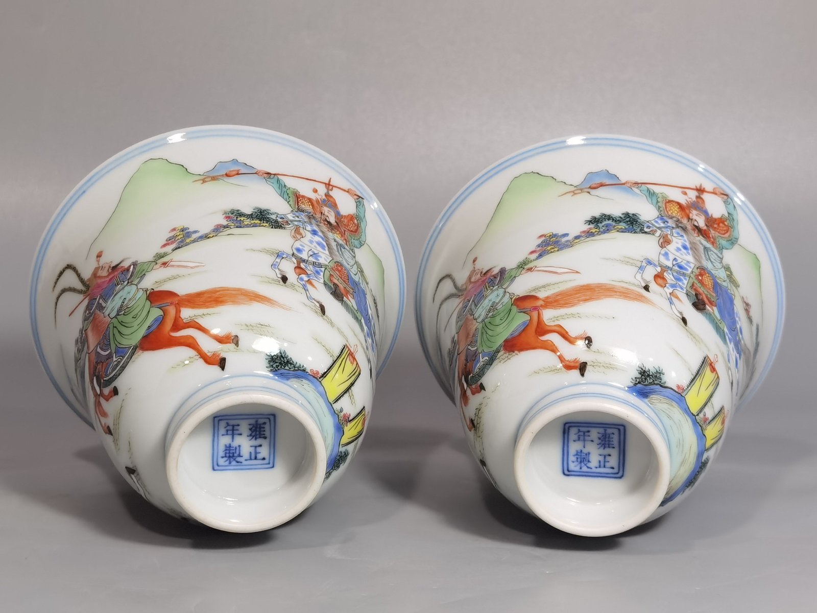 Qing Dynasty Yongzheng a pastel colored saber and horse figure warrior bell cup