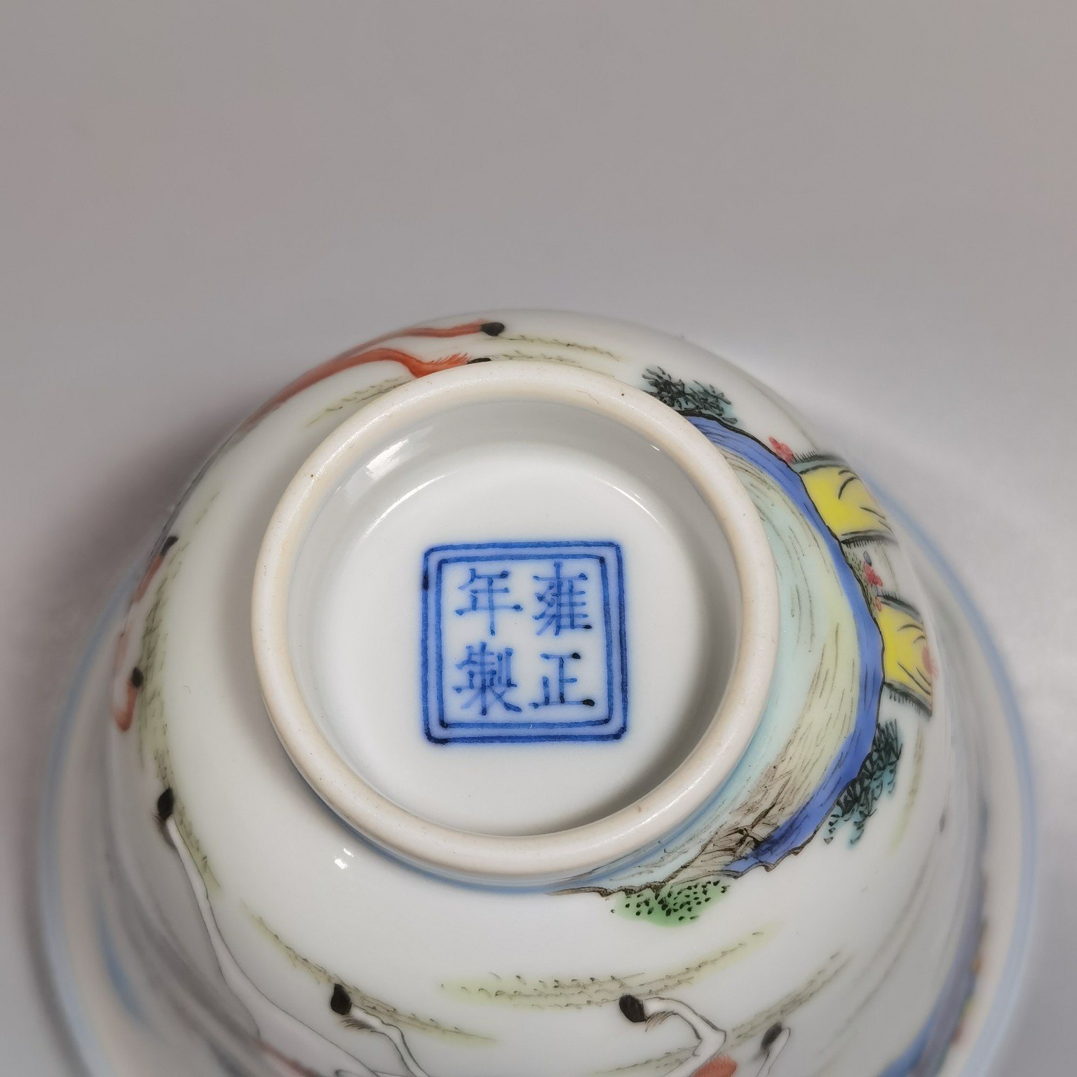 Qing Dynasty Yongzheng a pastel colored saber and horse figure warrior bell cup