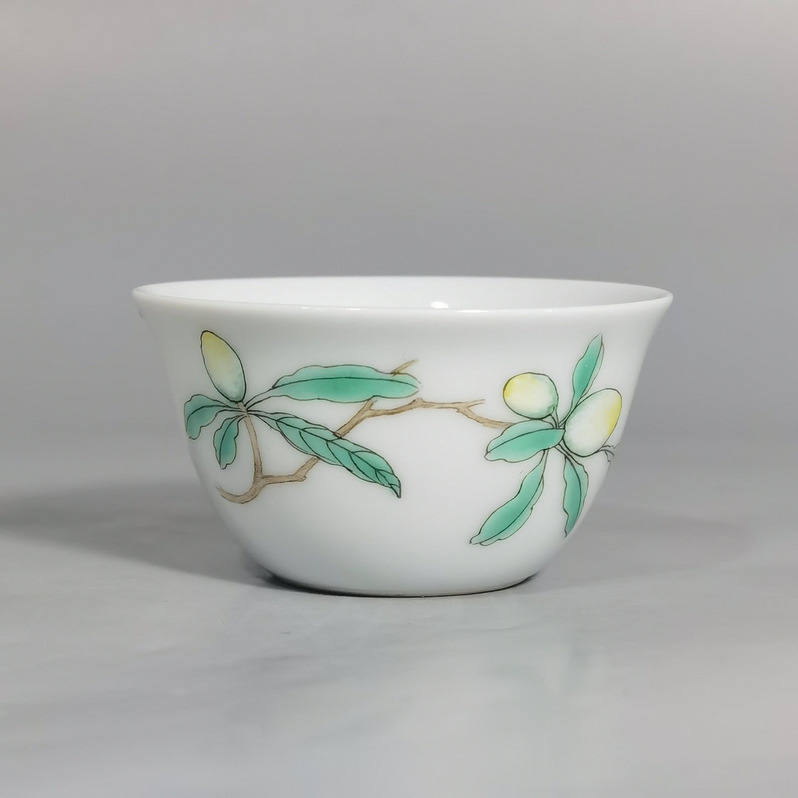 Qing Dynasty Yongzheng A pair of pastel flower and butterfly cups made during