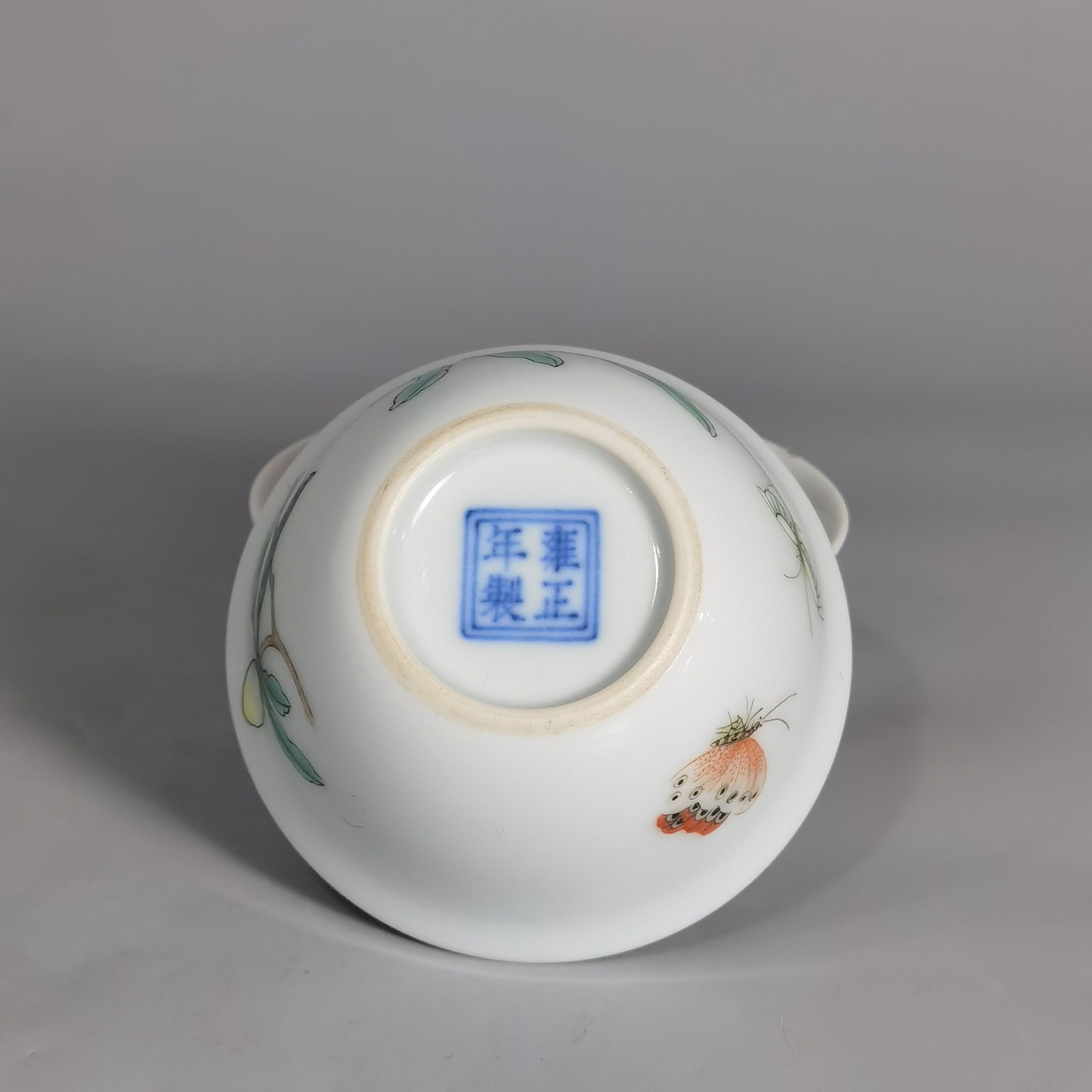Qing Dynasty Yongzheng A pair of pastel flower and butterfly cups made during