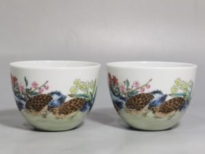 Qing Dynasty Yongzheng A pair of pastel Ping plum blossom cups
