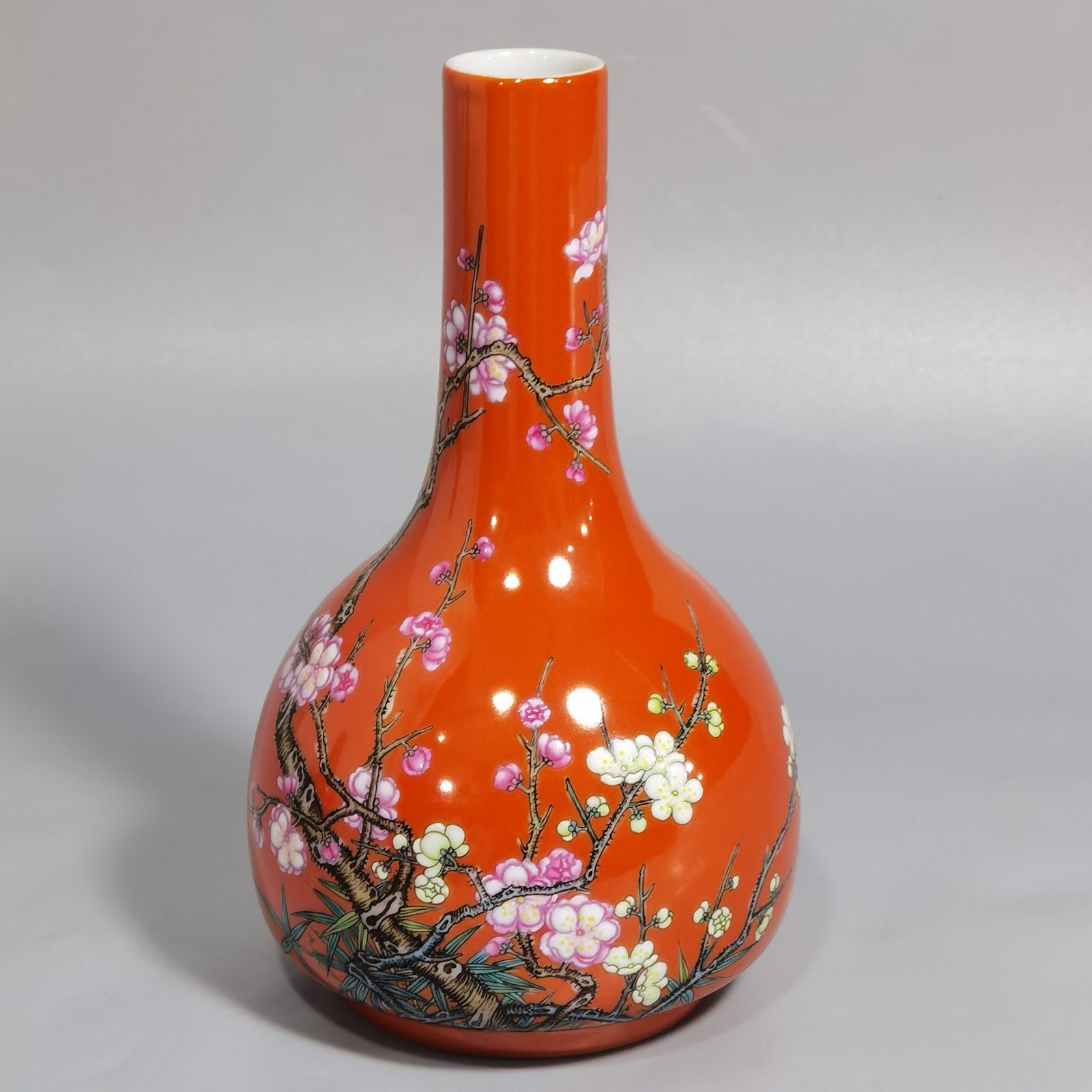 Qing Dynasty Yongzheng Coral Red Ground Poems Plum and Bamboo Spring Ringing Bell Statue