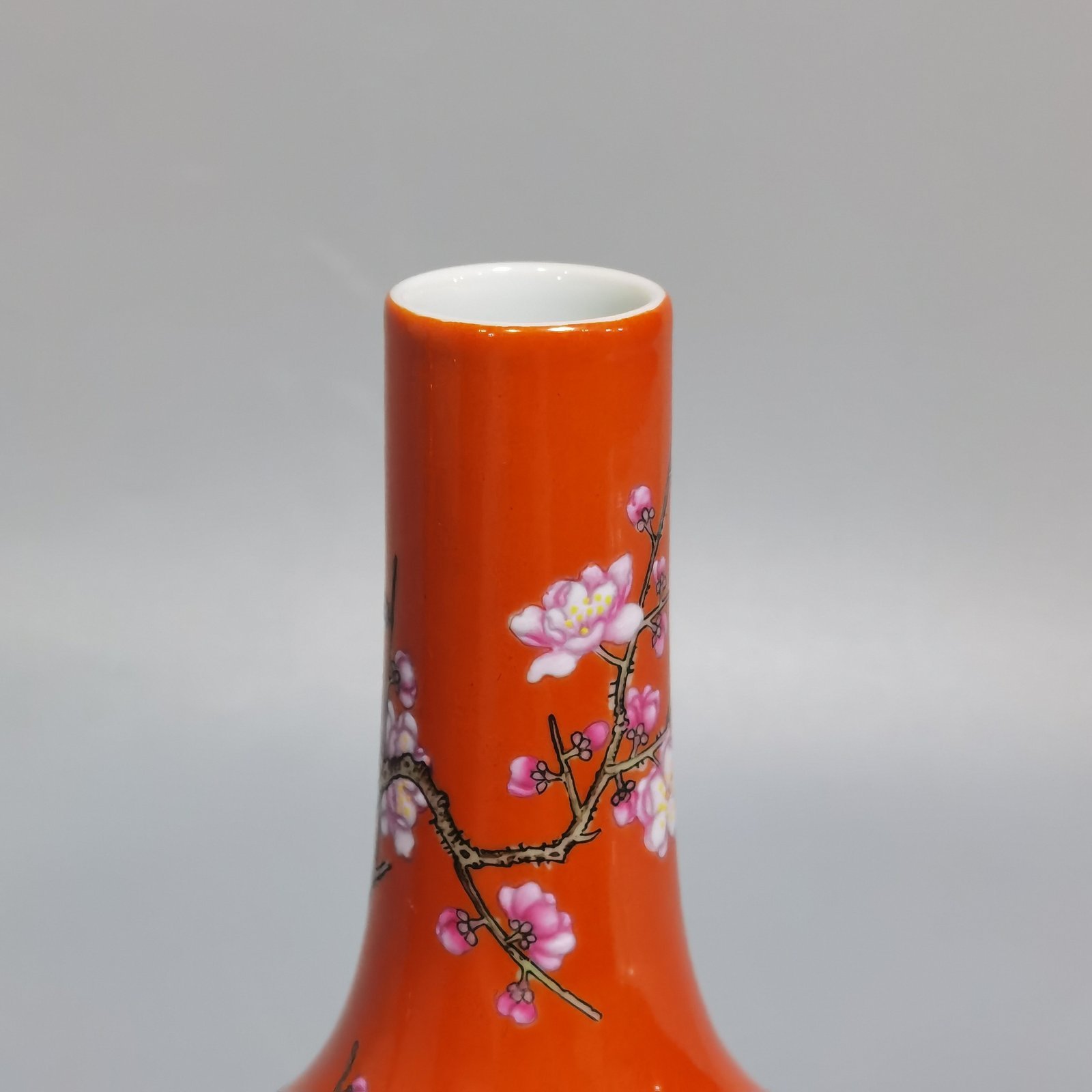 Qing Dynasty Yongzheng Coral Red Ground Poems Plum and Bamboo Spring Ringing Bell Statue