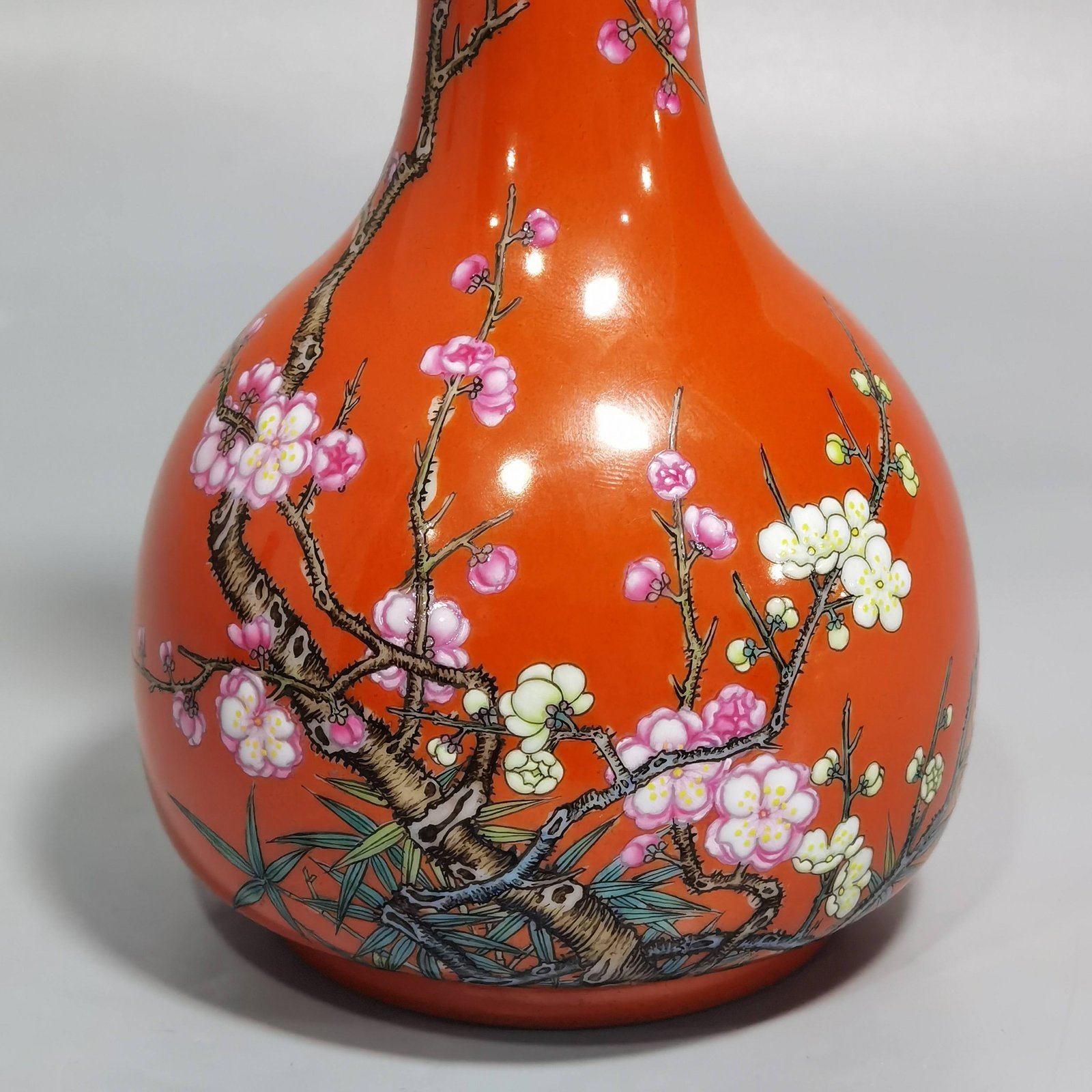 Qing Dynasty Yongzheng Coral Red Ground Poems Plum and Bamboo Spring Ringing Bell Statue