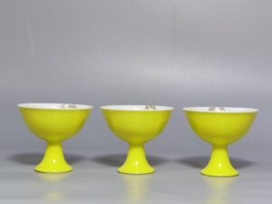 Qing Dynasty Yongzheng A set of enamel-colored goblets with lemon yellow glaze