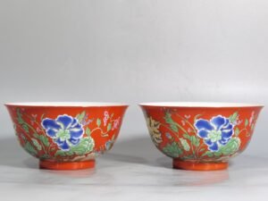 Qing Dynasty Yongzheng A pair of enamel-colored coral red ground nine-autumn bowls