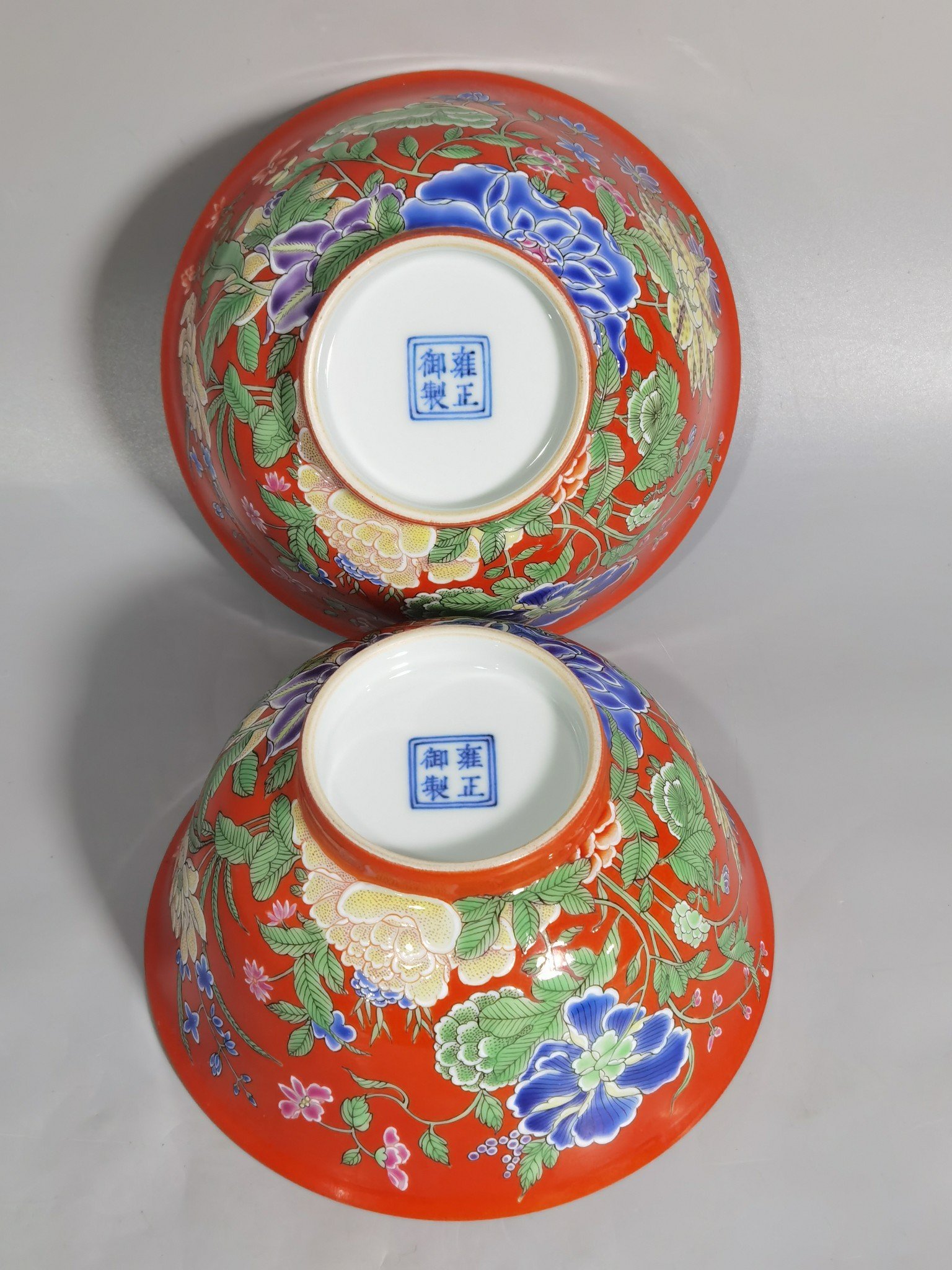 Qing Dynasty Yongzheng A pair of enamel-colored coral red ground nine-autumn bowls
