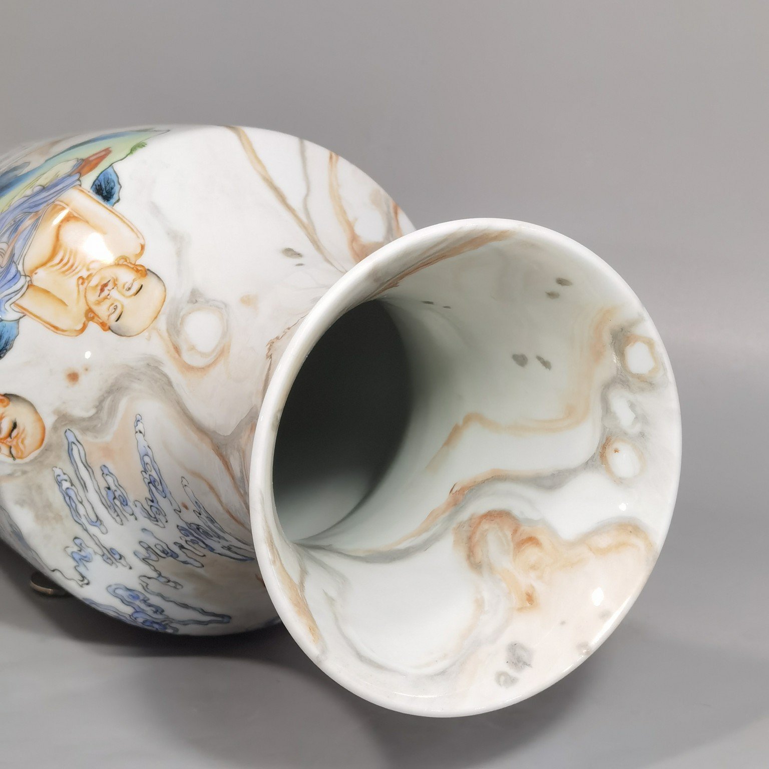 Qing Dynasty Yongzheng cloud pattern pastel color Guanyin bottle with picture of Arhat subduing the dragon