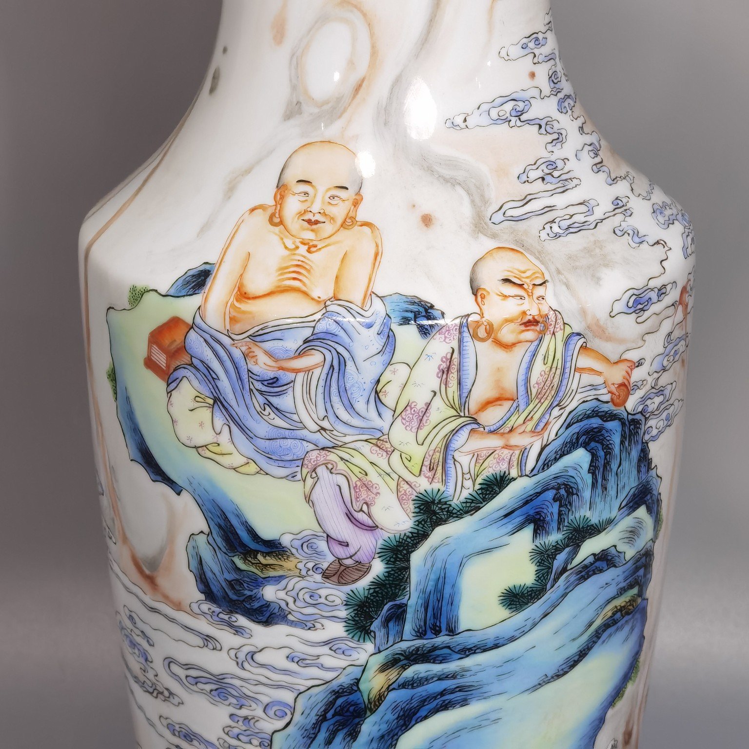 Qing Dynasty Yongzheng cloud pattern pastel color Guanyin bottle with picture of Arhat subduing the dragon