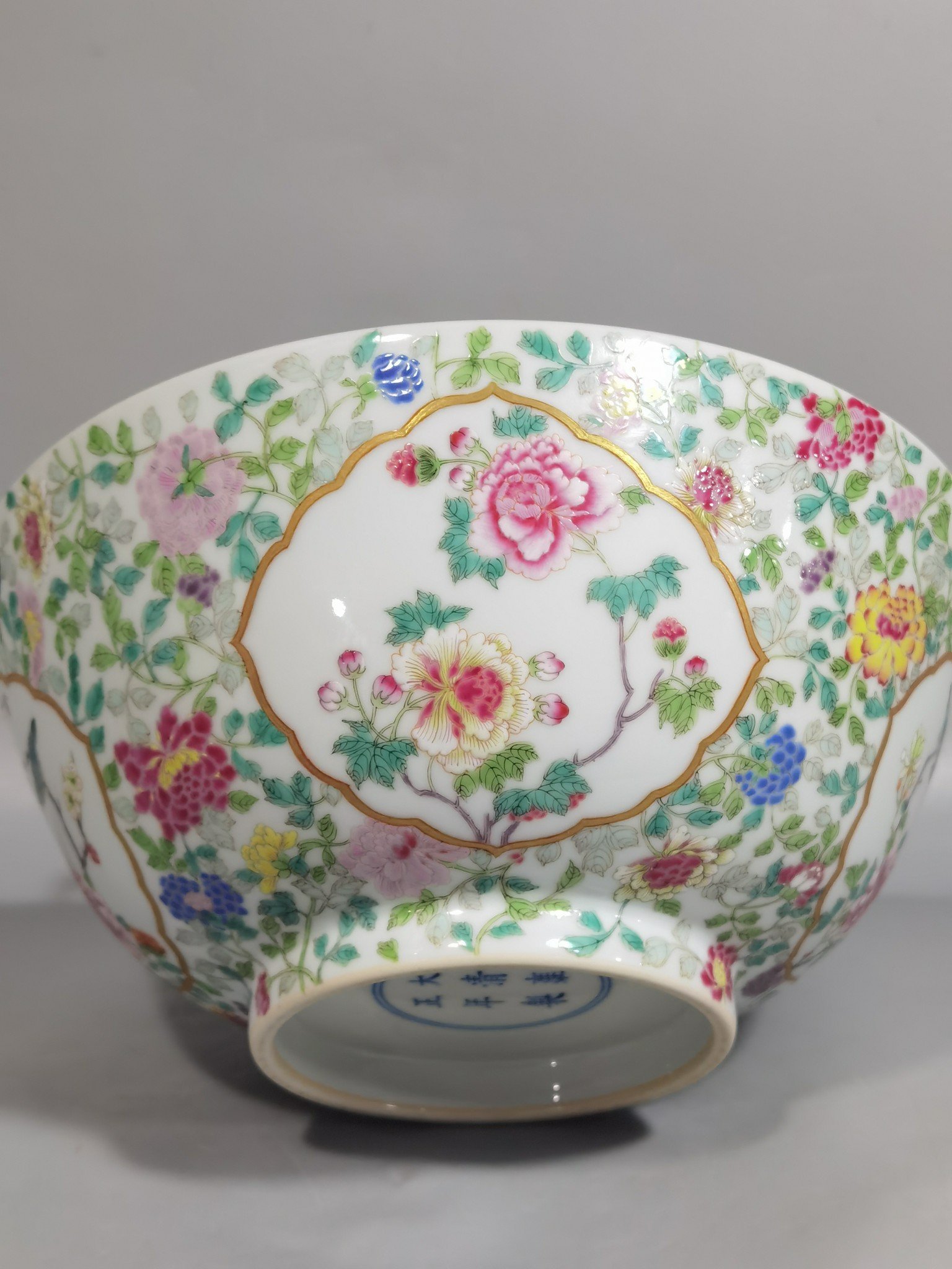 Qing Dynasty Yongzheng famille rose window flower and bird bowl