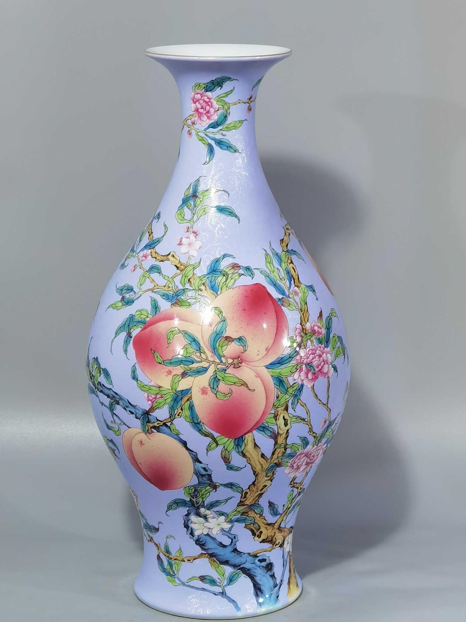 Qing Dynasty Yongzheng rolled pastel eight peaches and five blessings olive bottle