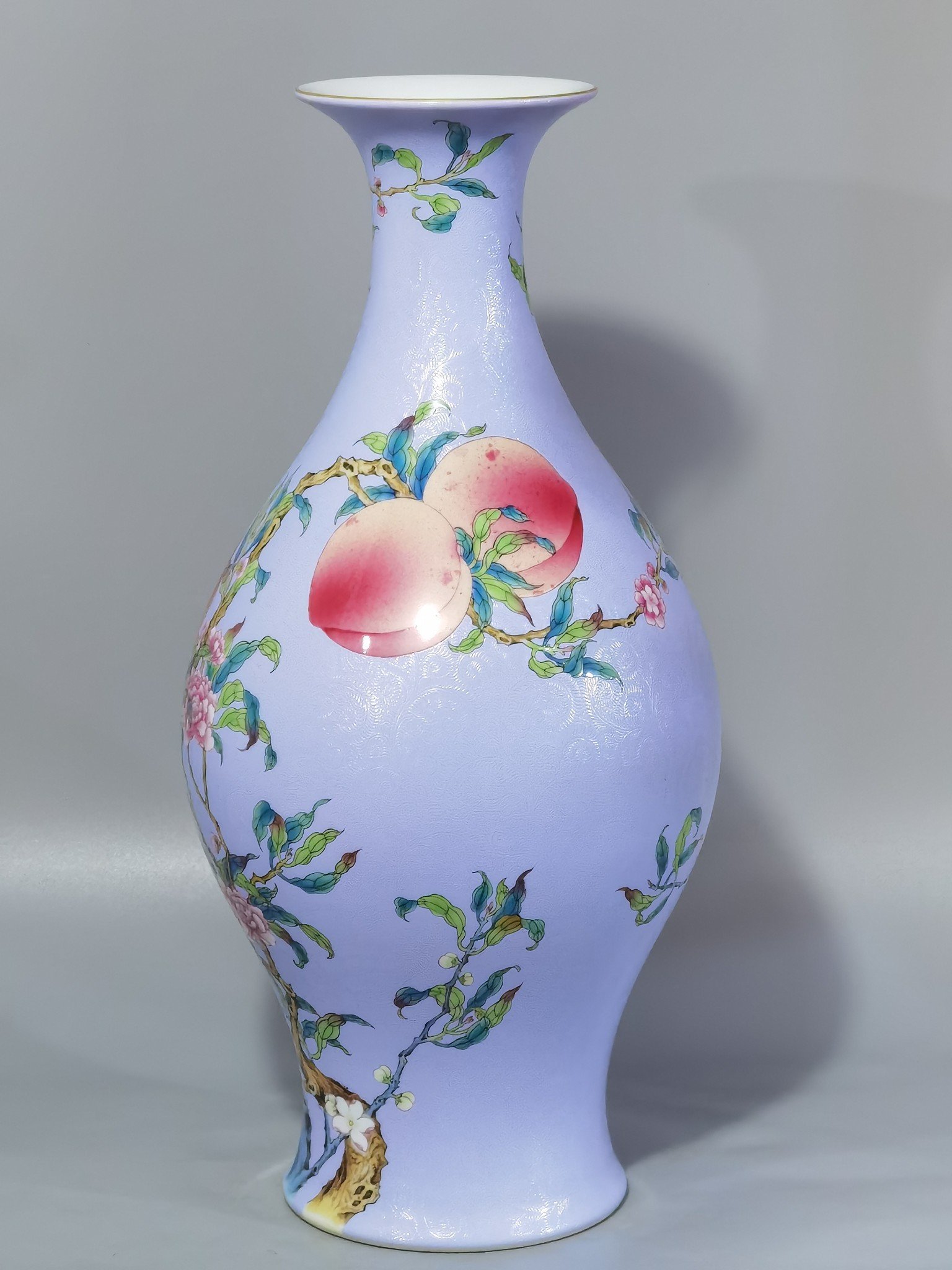 Qing Dynasty Yongzheng rolled pastel eight peaches and five blessings olive bottle