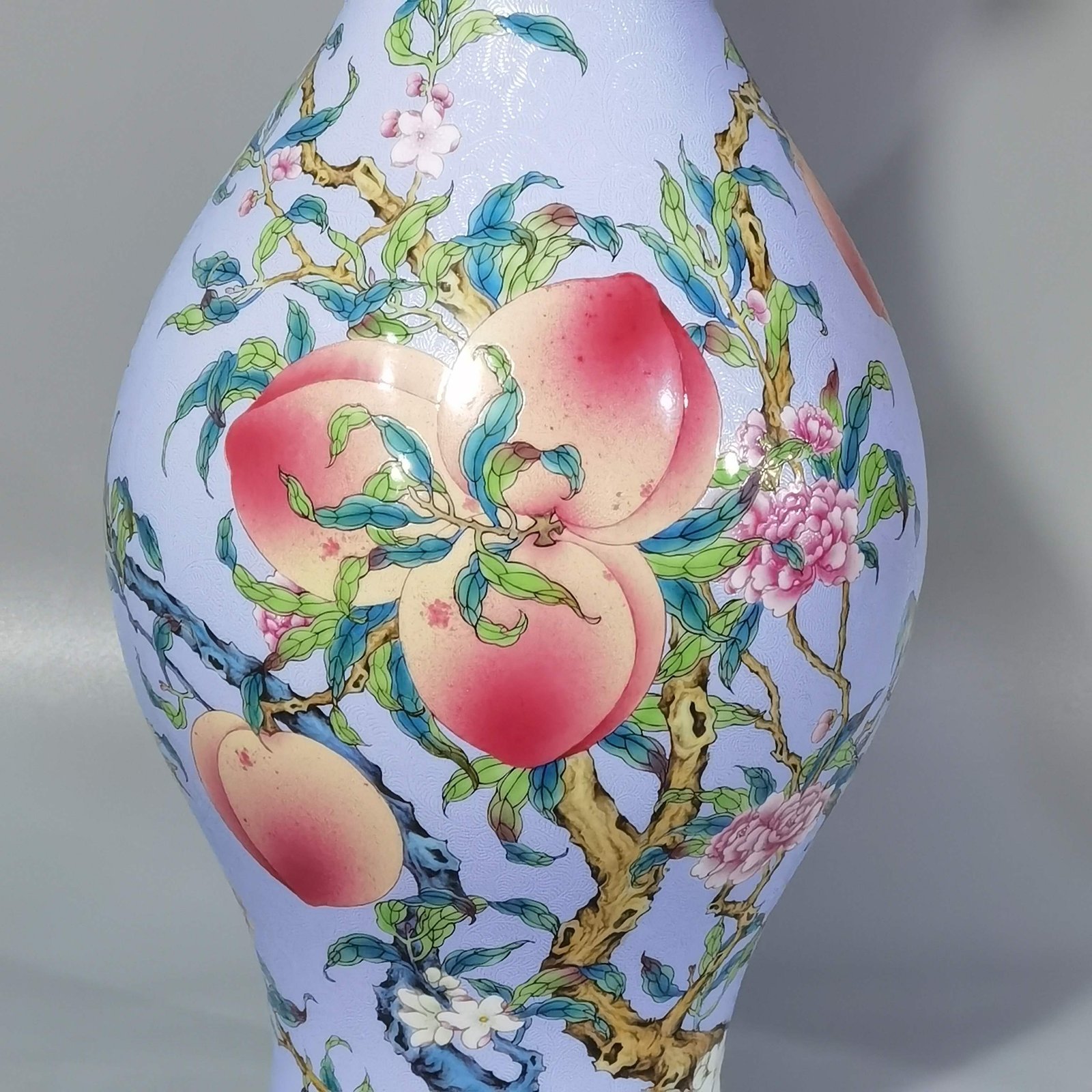 Qing Dynasty Yongzheng rolled pastel eight peaches and five blessings olive bottle