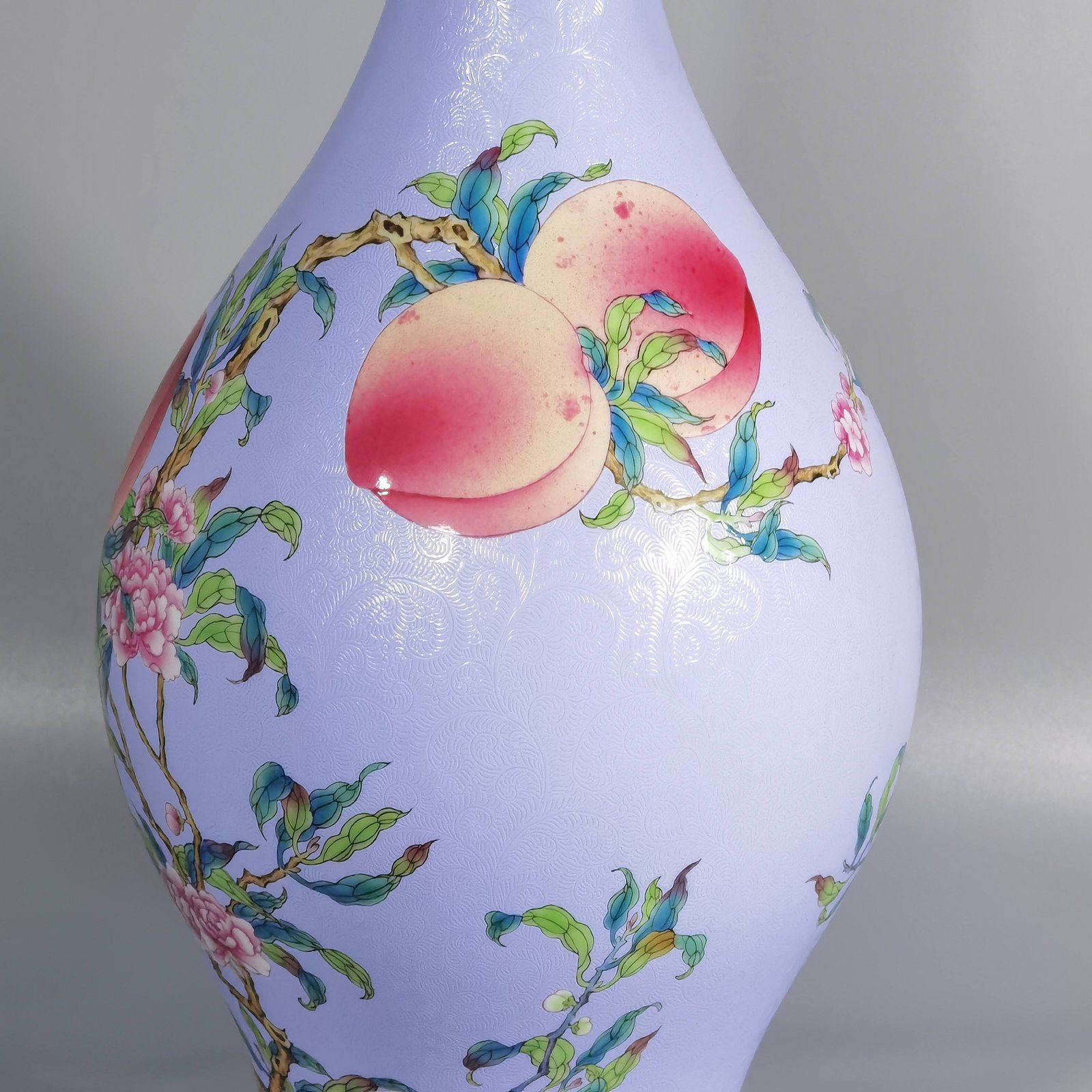 Qing Dynasty Yongzheng rolled pastel eight peaches and five blessings olive bottle