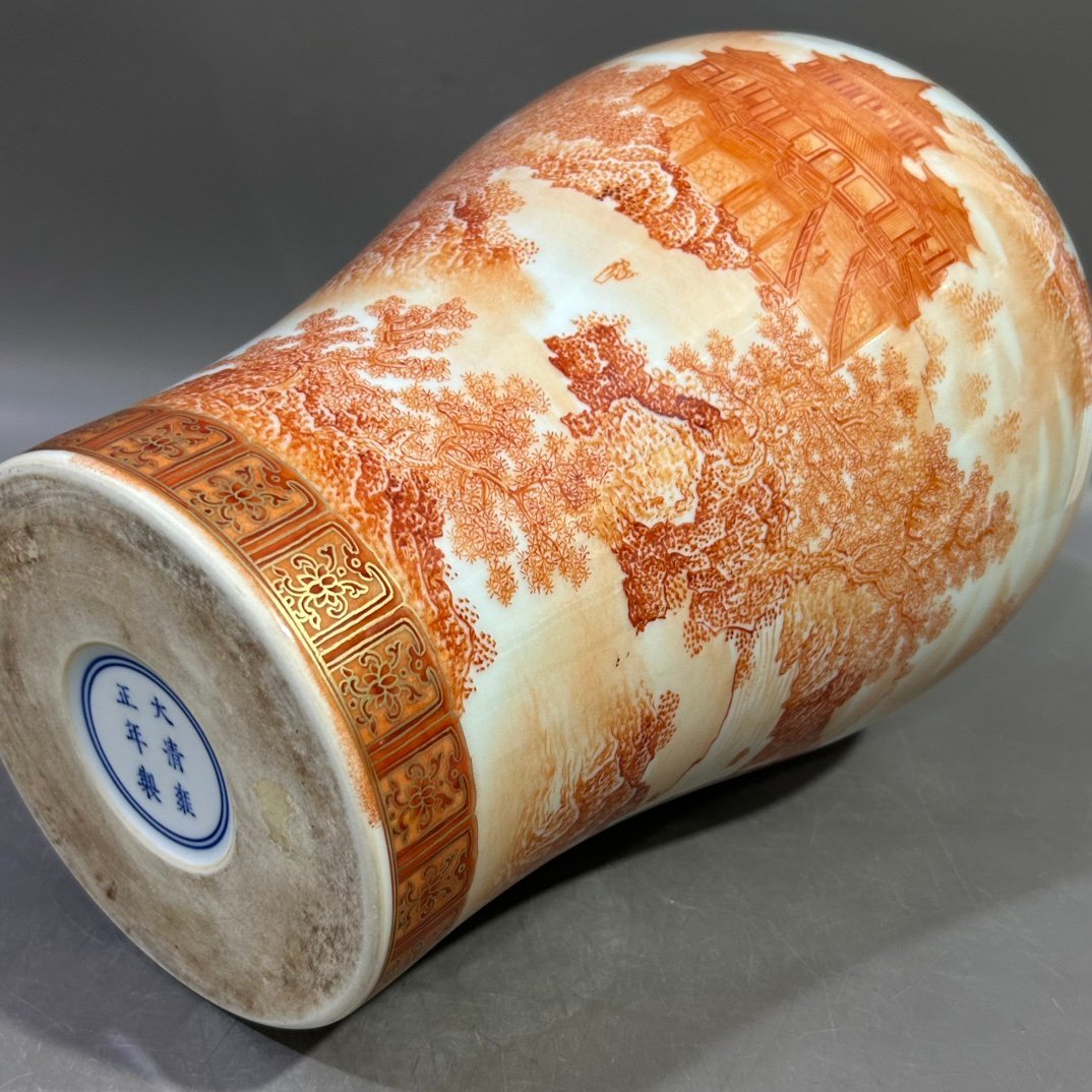 Qing Dynasty Yongzheng alum red landscape pavilion plum vase