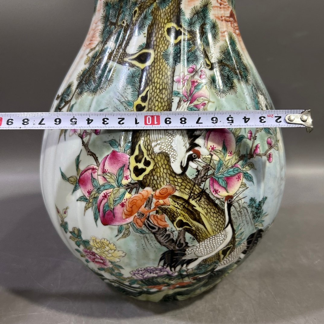 Qing Dynasty Yongzheng famille rose pine and crane with spring peach blessing Vase