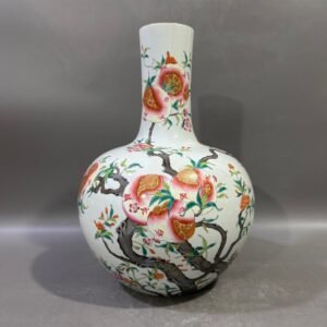 Qing Dynasty Yongzheng famille rose pomegranate celestial sphere vase
