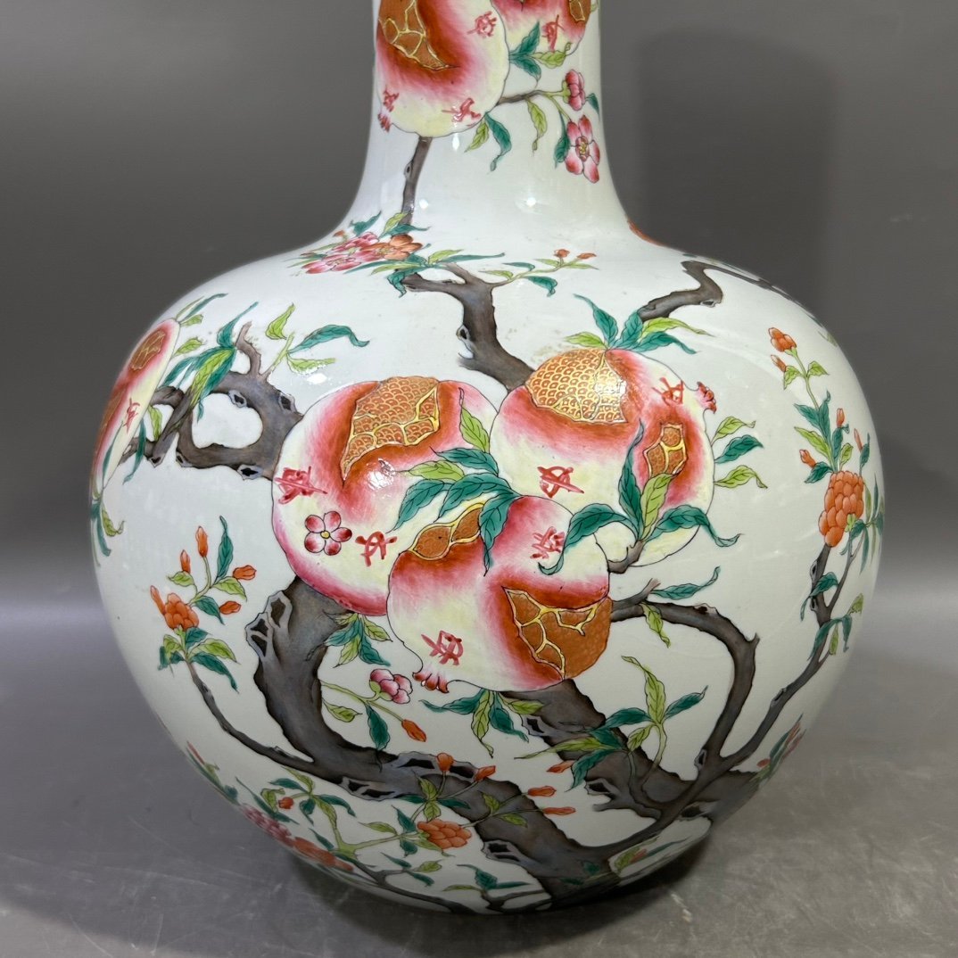 Qing Dynasty Yongzheng famille rose pomegranate celestial sphere vase