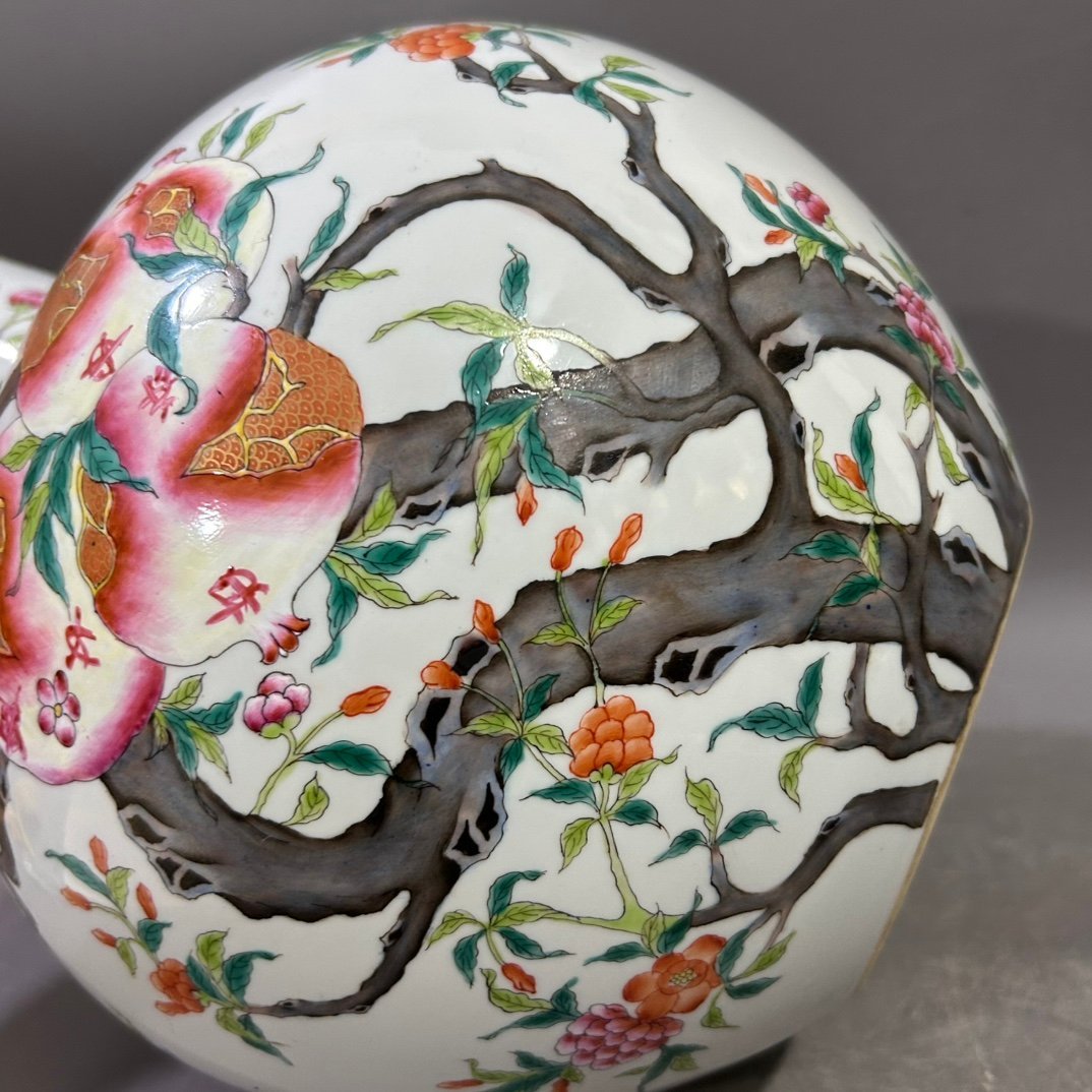 Qing Dynasty Yongzheng famille rose pomegranate celestial sphere vase