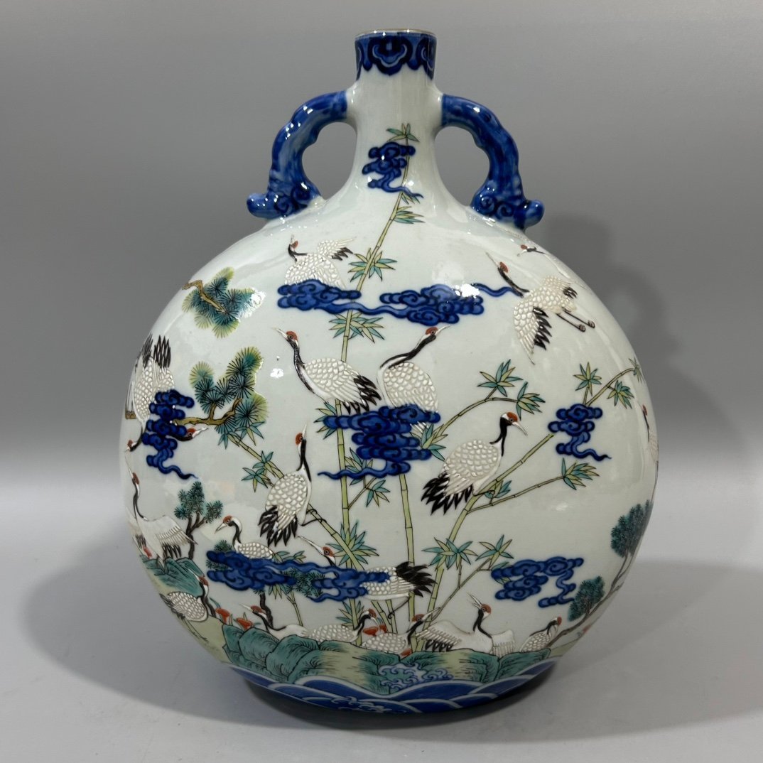 Qing Dynasty Yongzheng blue and white vase with colorful pine and crane holding the moon in spring