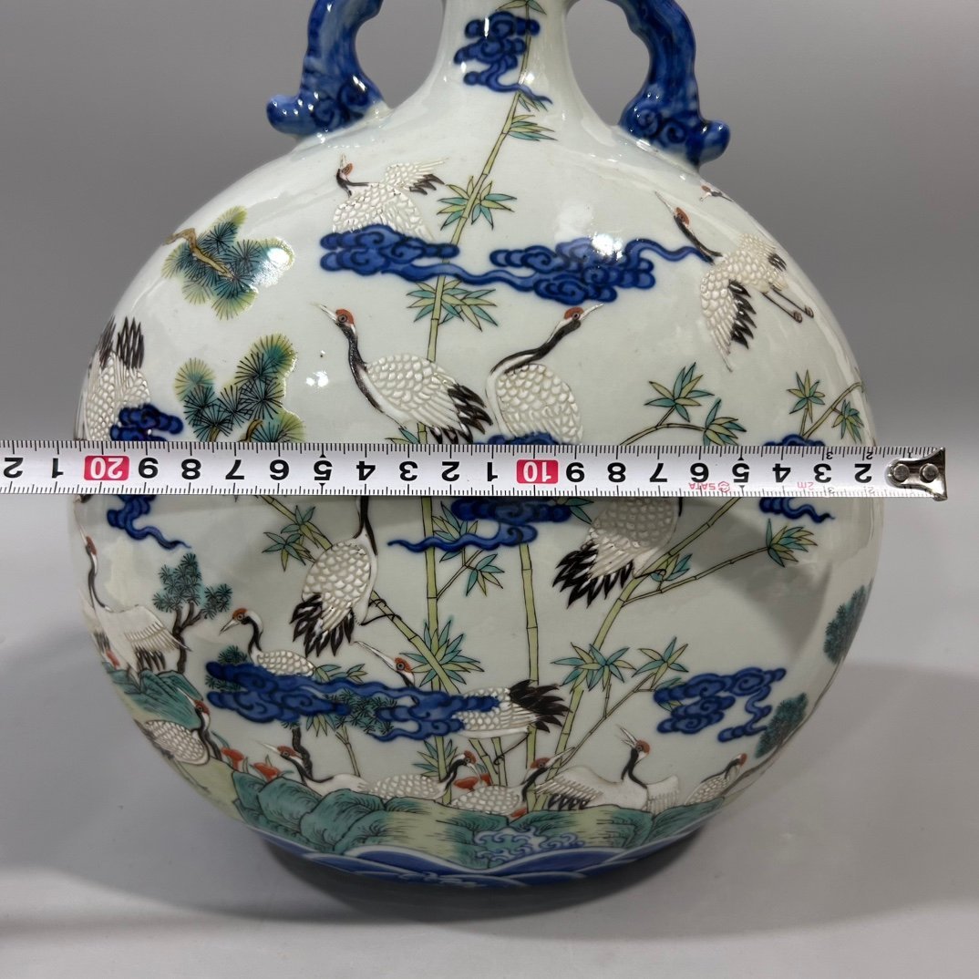 Qing Dynasty Yongzheng blue and white vase with colorful pine and crane holding the moon in spring