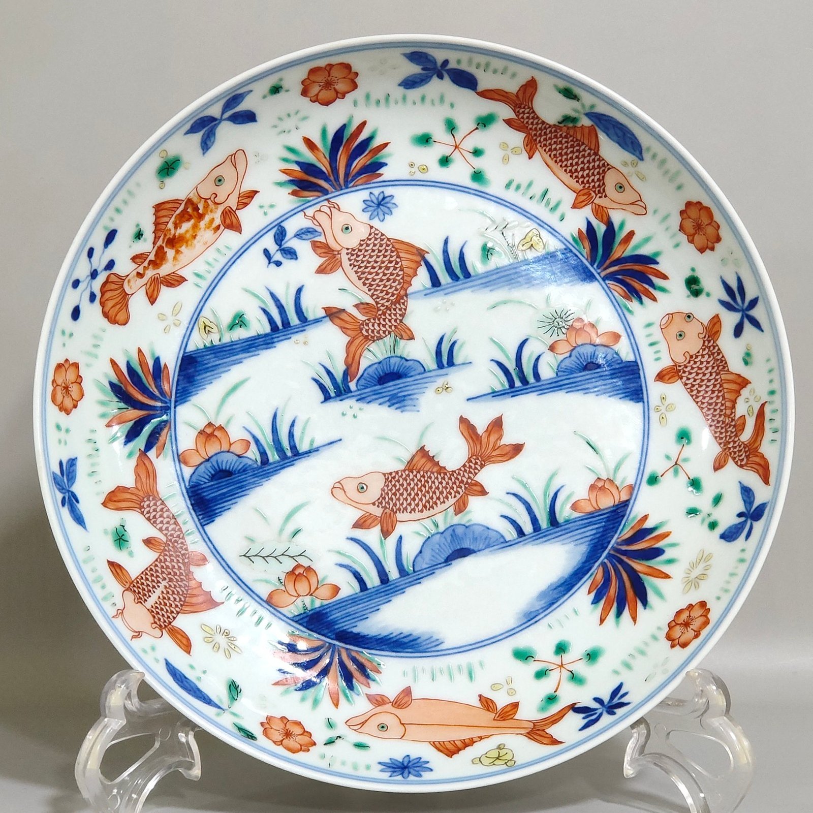 Qing Dynasty Yongzheng famille rose fish and algae pattern plate
