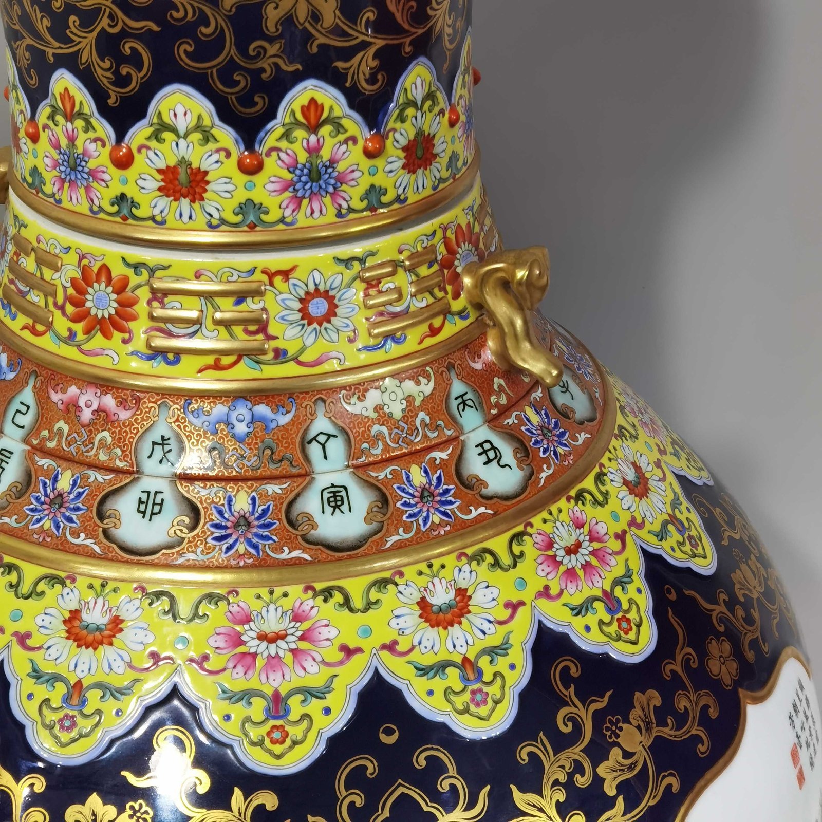 Qing Dynasty Qianlong blue glaze and gold open window four seasons landscape amphora