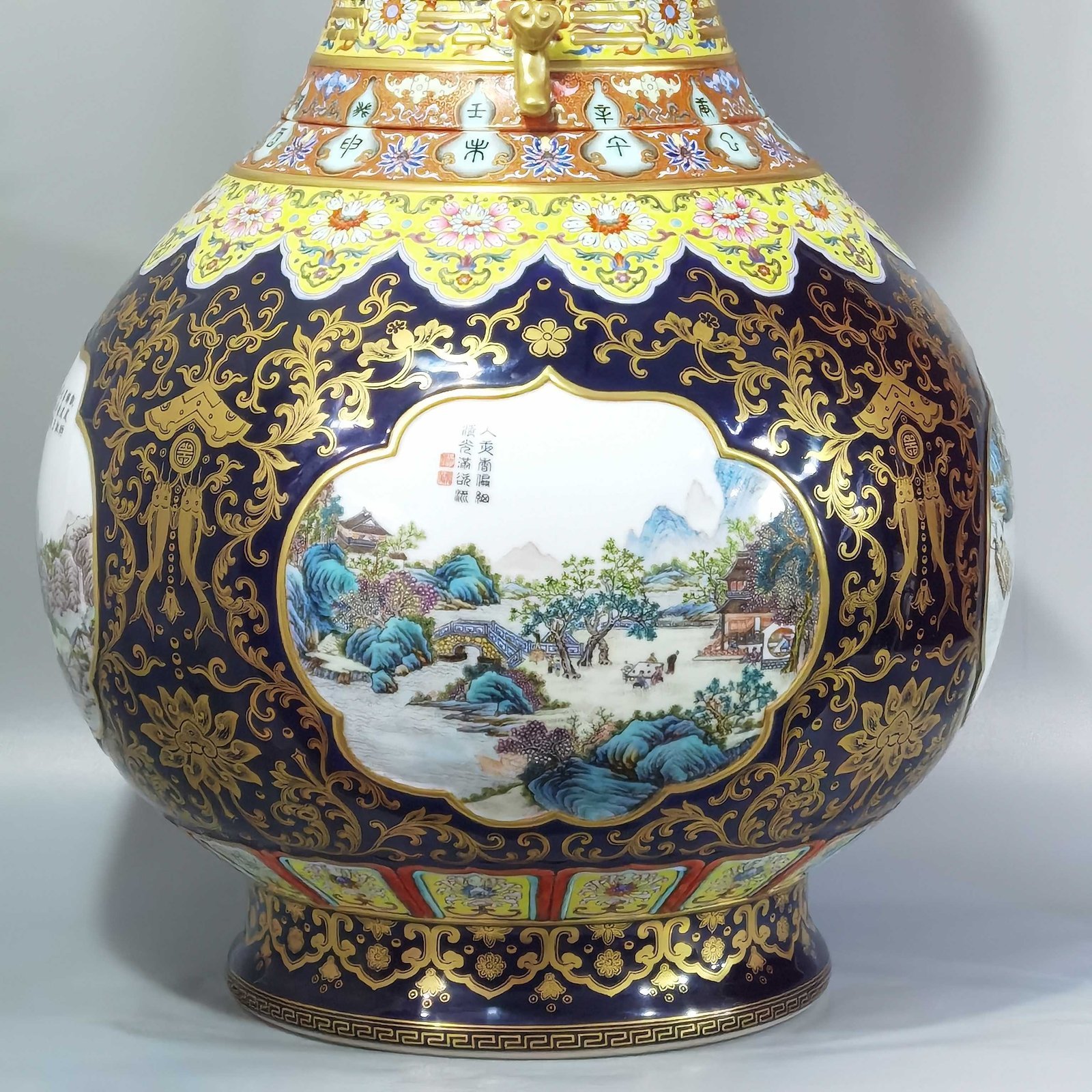 Qing Dynasty Qianlong blue glaze and gold open window four seasons landscape amphora