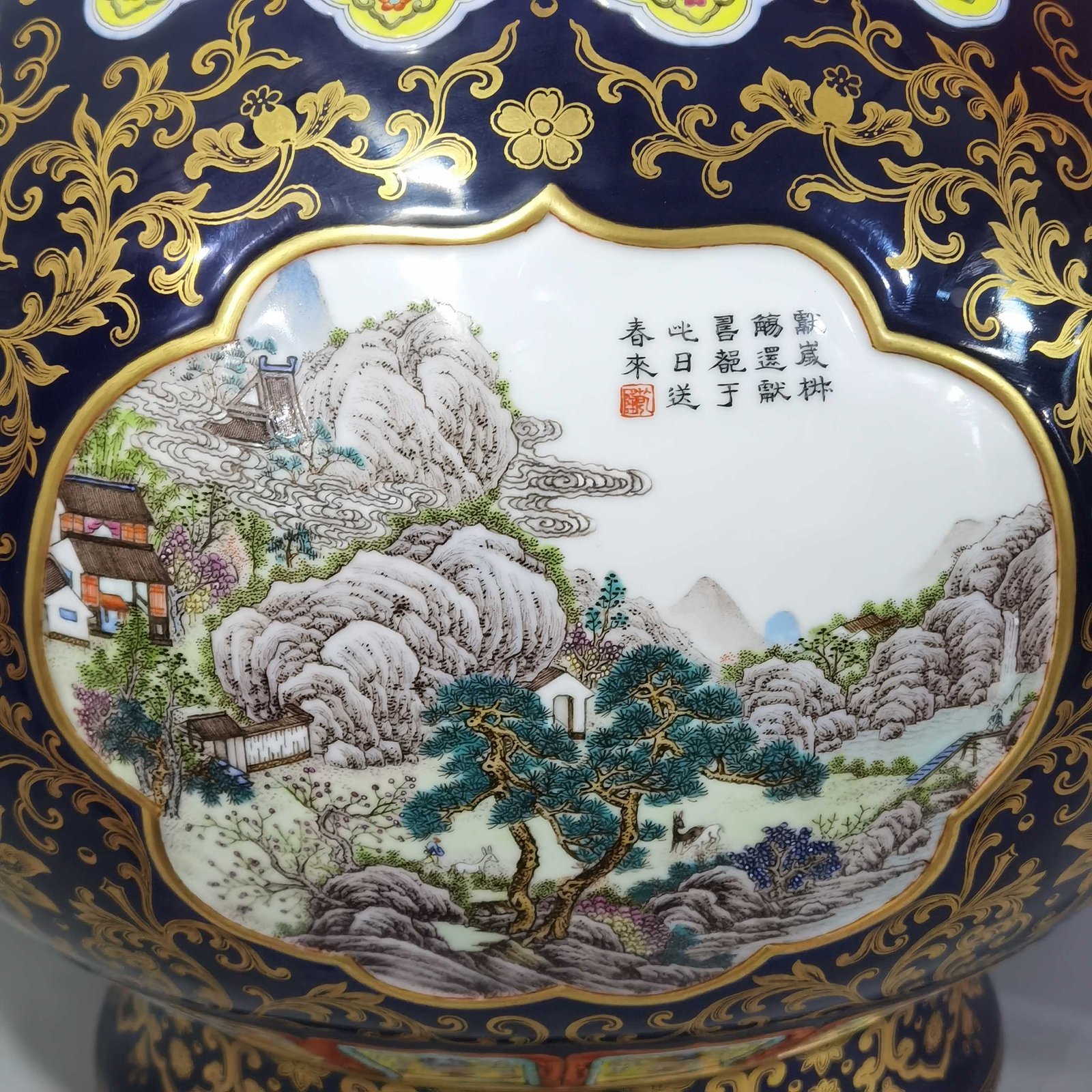Qing Dynasty Qianlong blue glaze and gold open window four seasons landscape amphora