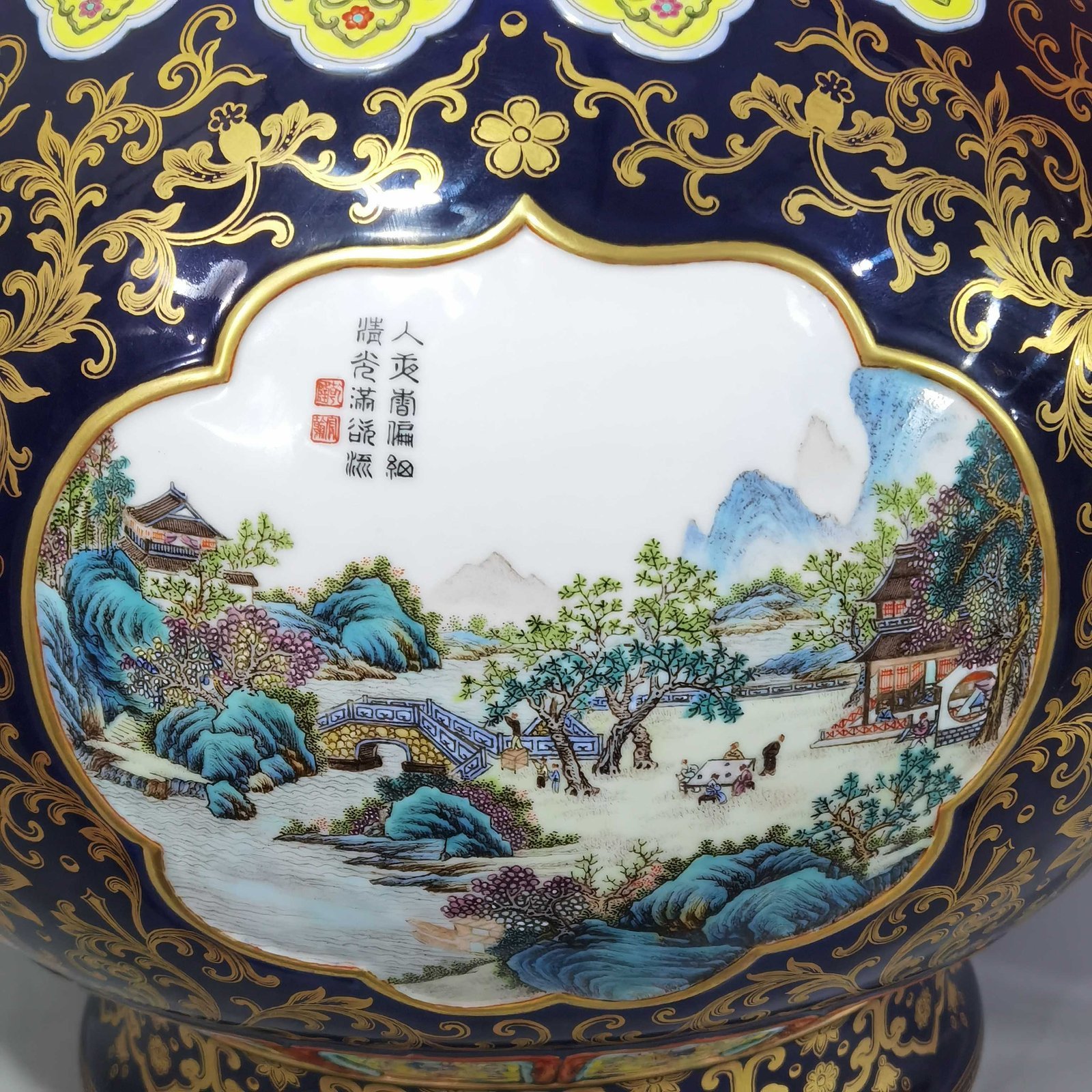 Qing Dynasty Qianlong blue glaze and gold open window four seasons landscape amphora