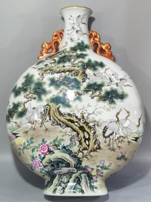 Qing Dynasty Qianlong pastel pine and crane longevity flat two-eared vase