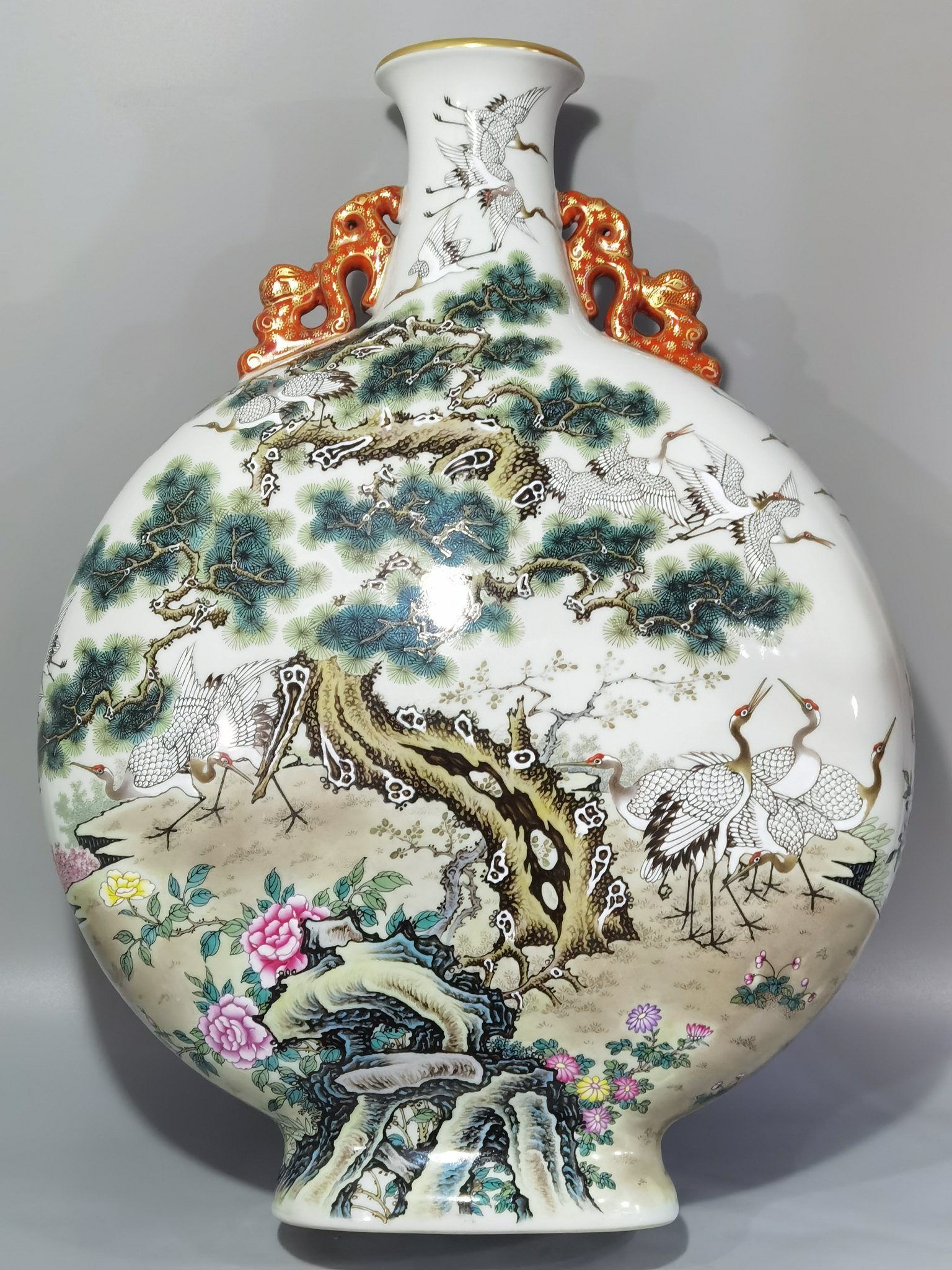 Qing Dynasty Qianlong pastel pine and crane longevity flat two-eared vase