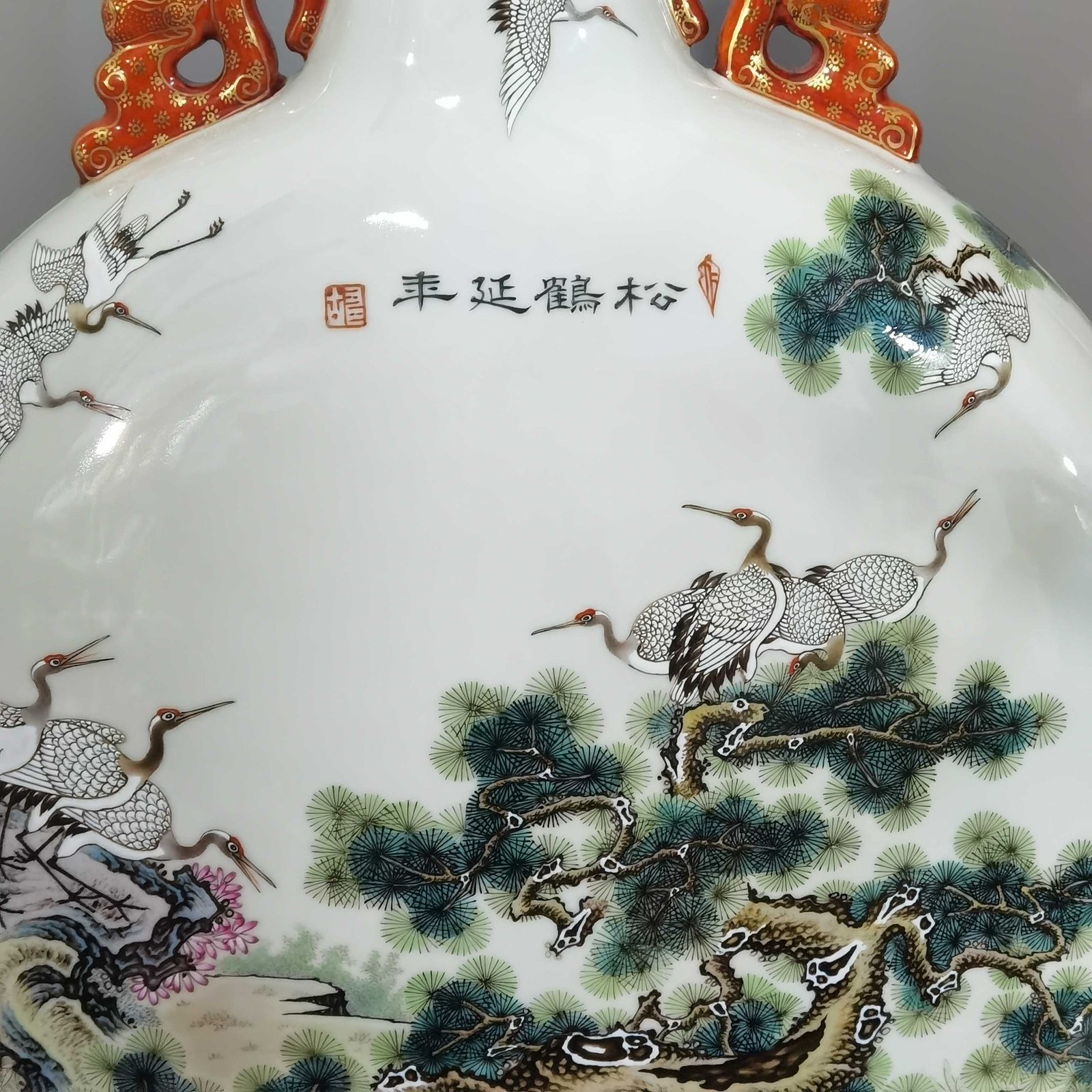 Qing Dynasty Qianlong pastel pine and crane longevity flat two-eared vase