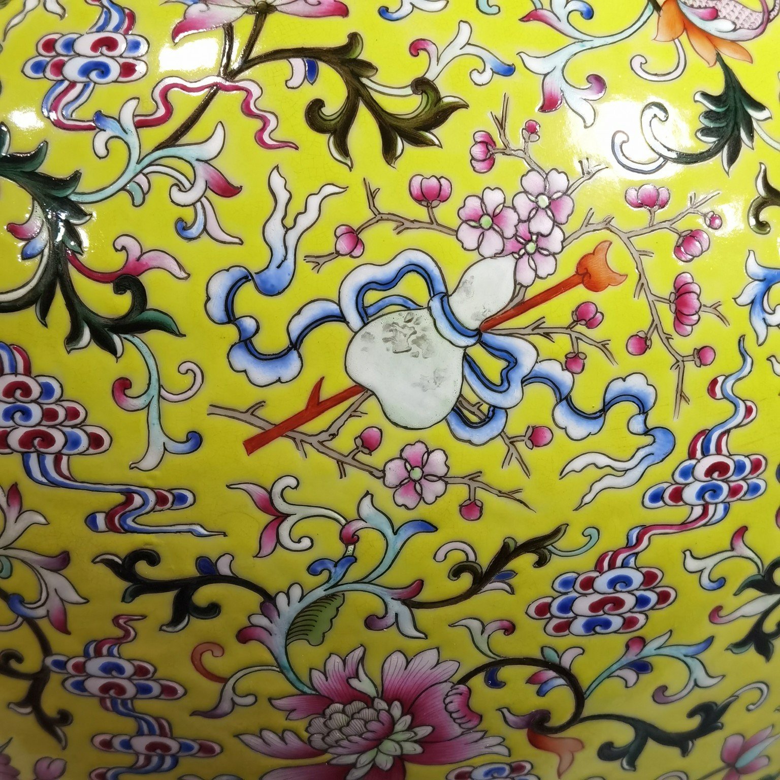 Qing Dynasty Qianlong pastel yellow ground and dark eight immortals entwining lotus vase