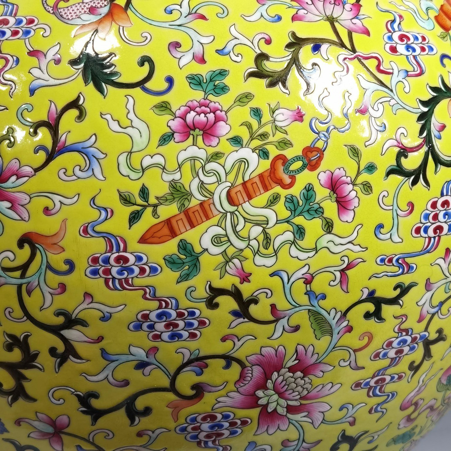 Qing Dynasty Qianlong pastel yellow ground and dark eight immortals entwining lotus vase