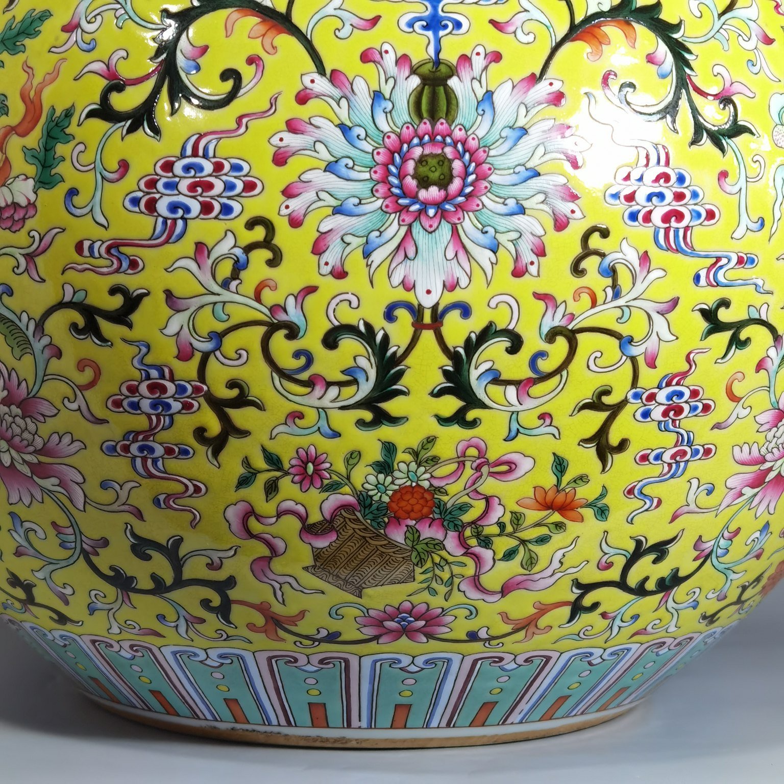 Qing Dynasty Qianlong pastel yellow ground and dark eight immortals entwining lotus vase