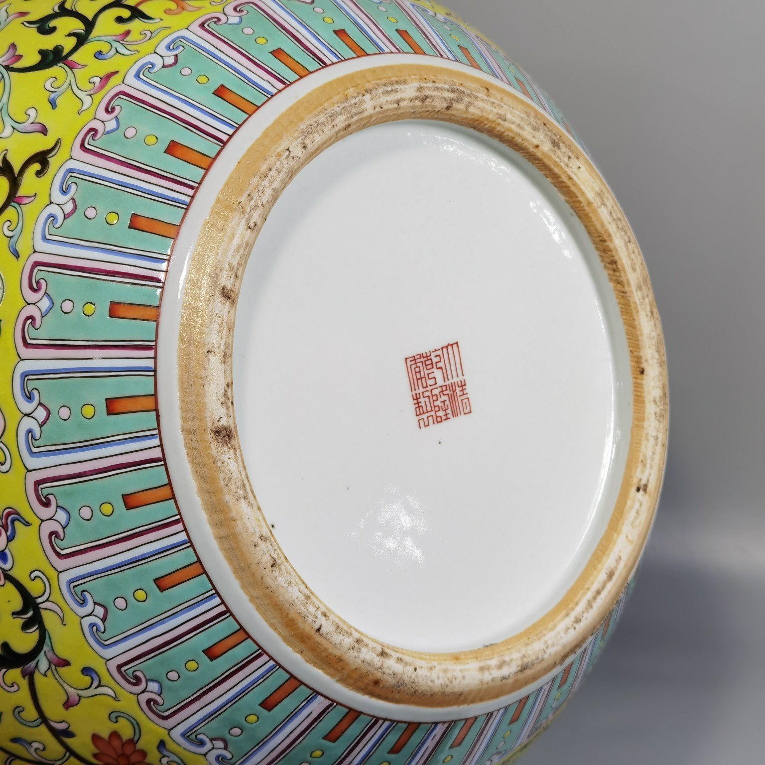 Qing Dynasty Qianlong pastel yellow ground and dark eight immortals entwining lotus vase
