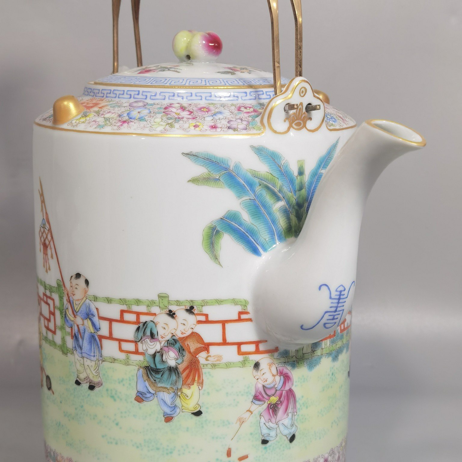 Oing Dynasty Yongzheng a set of pastel teapots with golden baby playing patterns