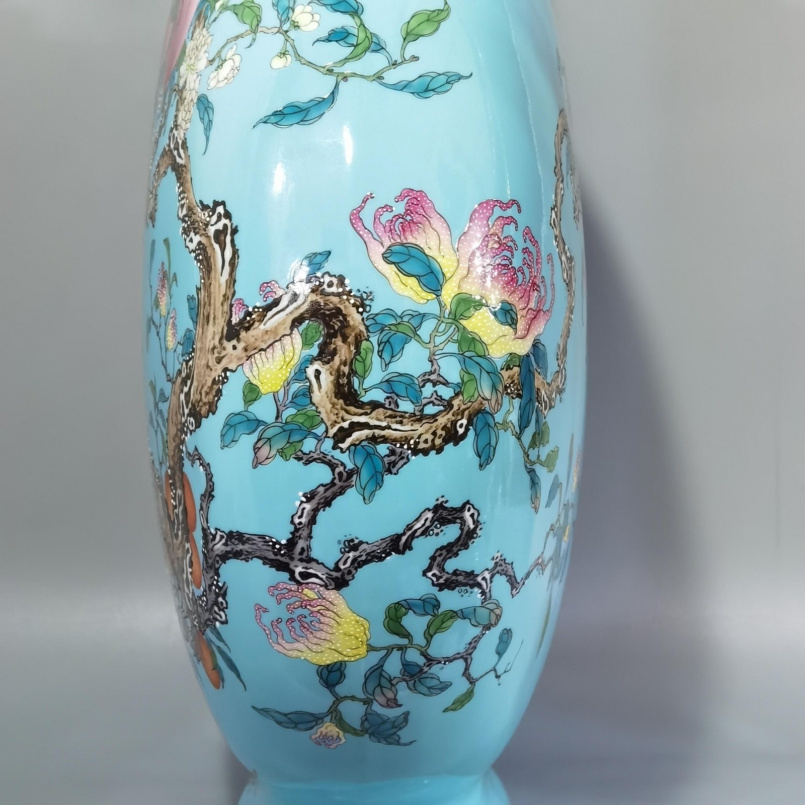 Qing Dynasty Qianlong turquoise green ground pastel double ears holding the moon flat vase