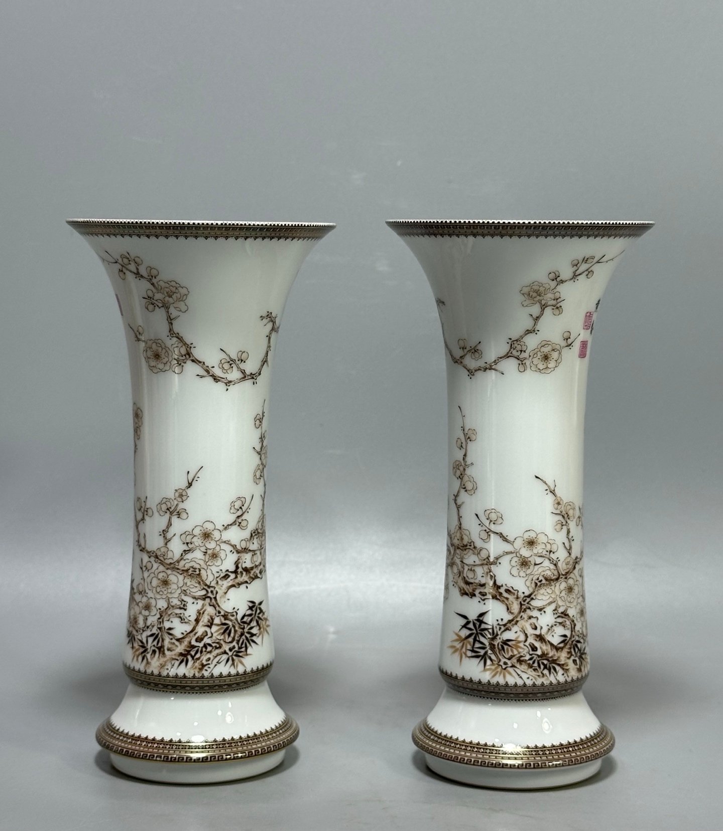 Oing Dynasty Yongzheng year enamel vase with gold and ink colors bamboo and plum pattern