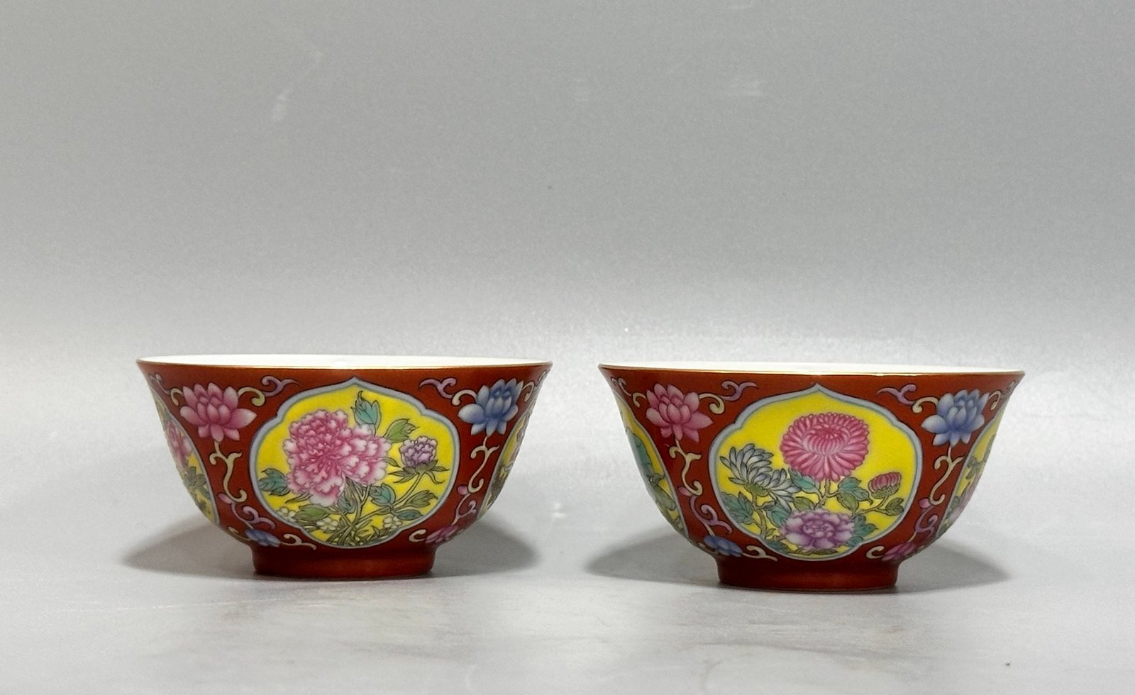 Oing Dynasty Yongzheng year carmine red cup with window opening and floral pattern