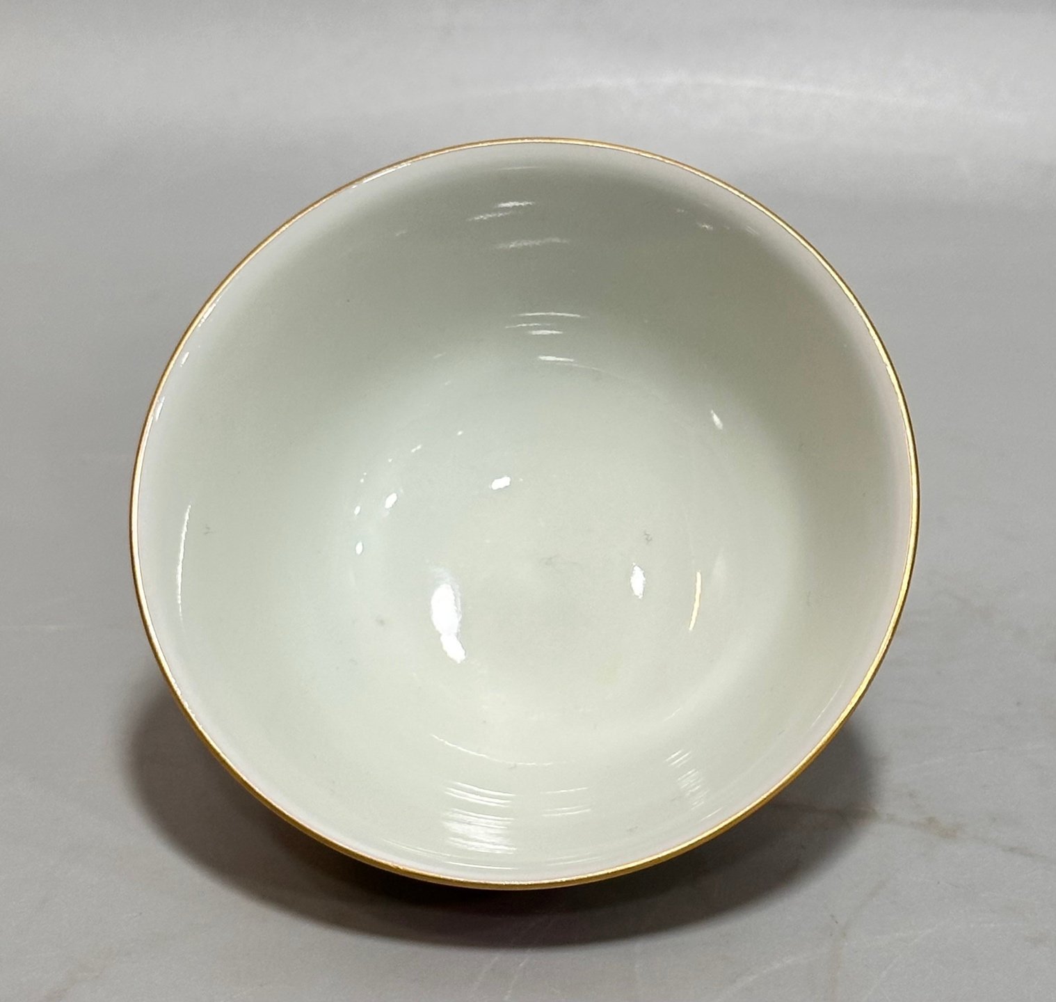 Oing Dynasty Yongzheng year carmine red cup with window opening and floral pattern