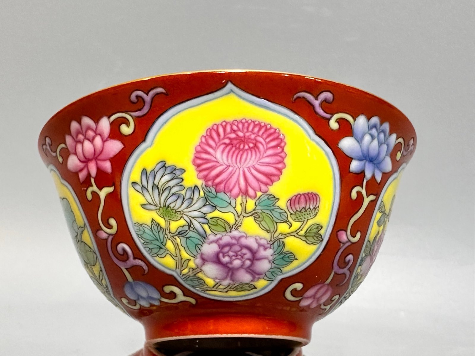 Oing Dynasty Yongzheng year carmine red cup with window opening and floral pattern
