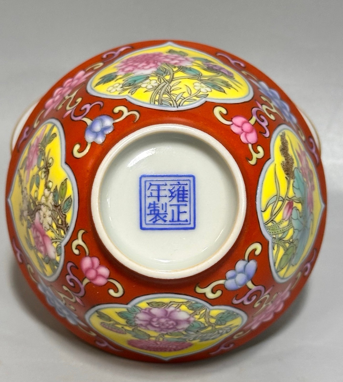 Oing Dynasty Yongzheng year carmine red cup with window opening and floral pattern