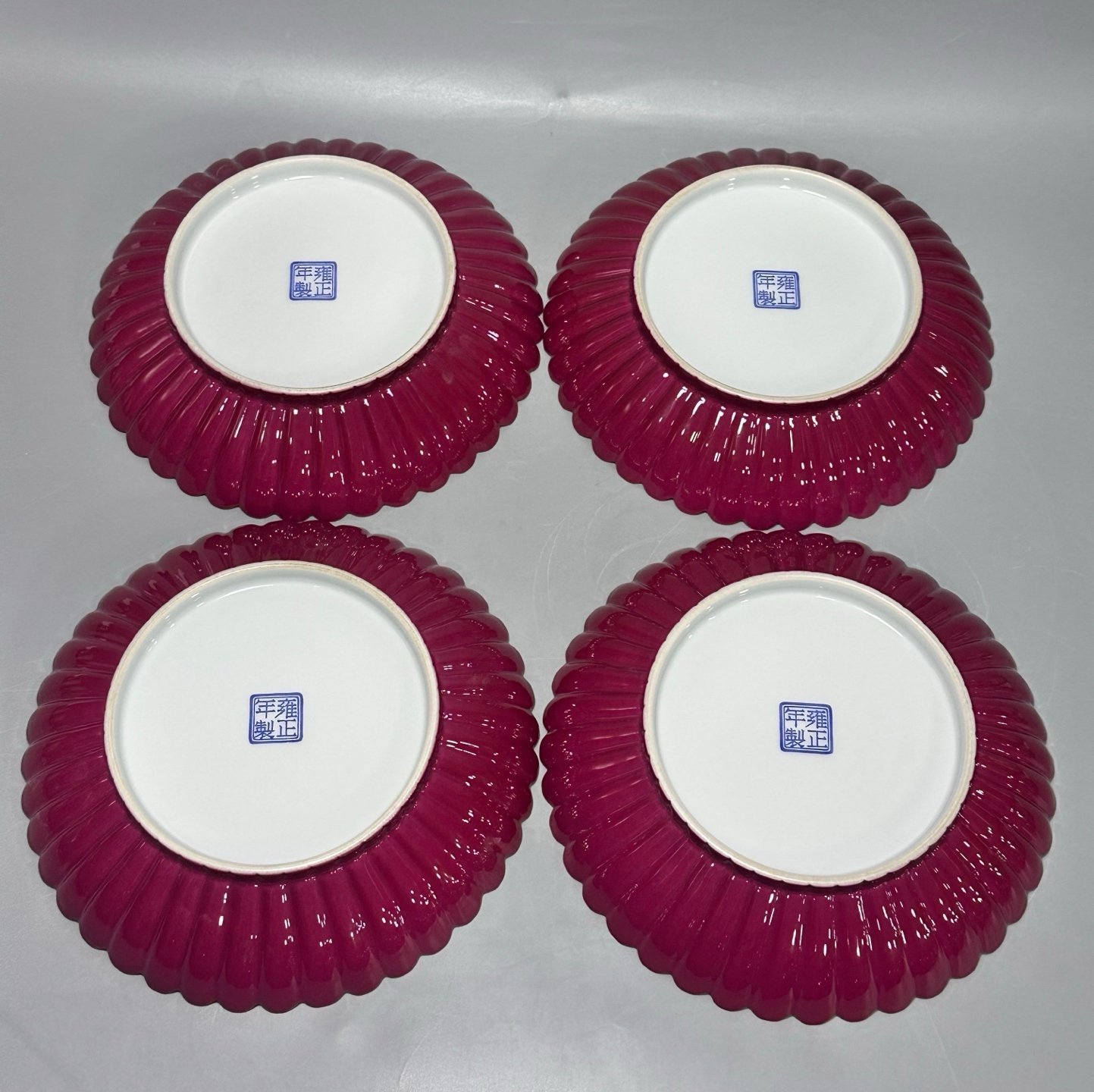 Oing Dynasty Yongzhenga carmine red enamel plate with four seasons floral patterns