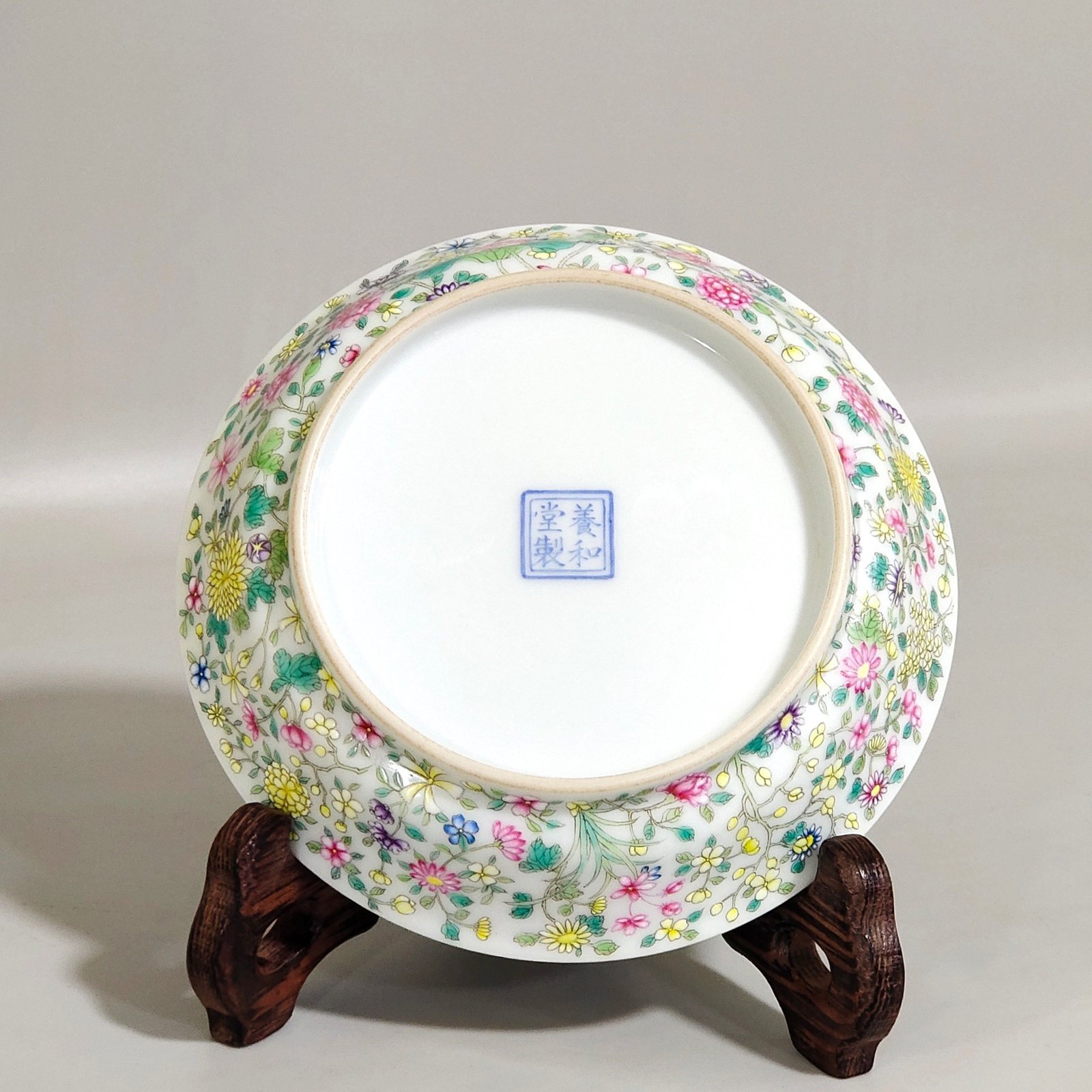 Oing Dynasty Yongzheng A small bent-waist plate with thousands of flowers and brocade patterns