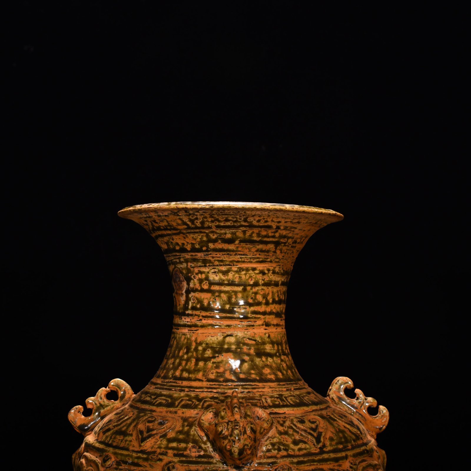 Jin Dynasty Yue kiln celadon vase with Kui dragon and animal ears